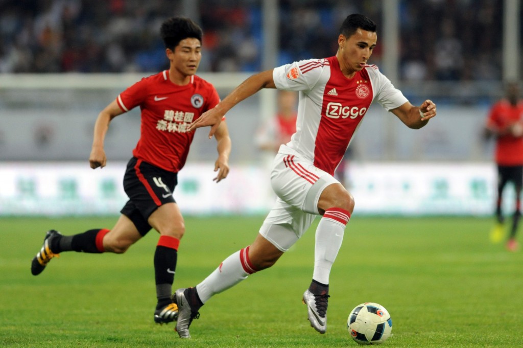 El-Ghazi Anwar (R) of Ajax Amsterdam controls the ball during a friendly match against Chinese Super League club Liaoning Whowin FC in Shenyang, northeast China's Liaoning province on May 18, 2016. / AFP / - (Photo credit should read -/AFP/Getty Images)