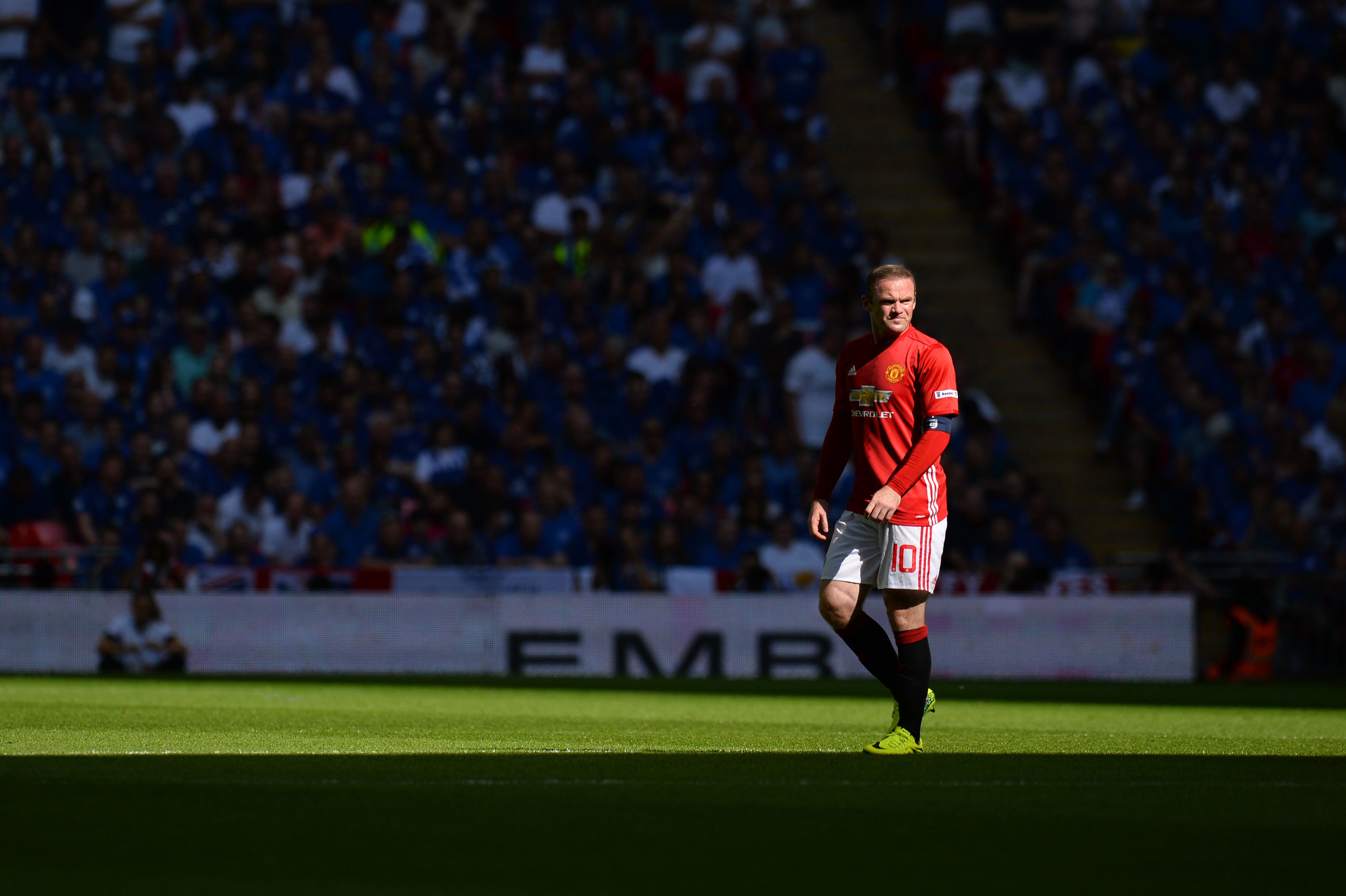 Manchester United's English striker Wayne Rooney plays during the FA Community Shield football match between Manchester United and Leicester City at Wembley Stadium in London on August 7, 2016. (Photo by Glyn Kirk/AFP/Getty Images)