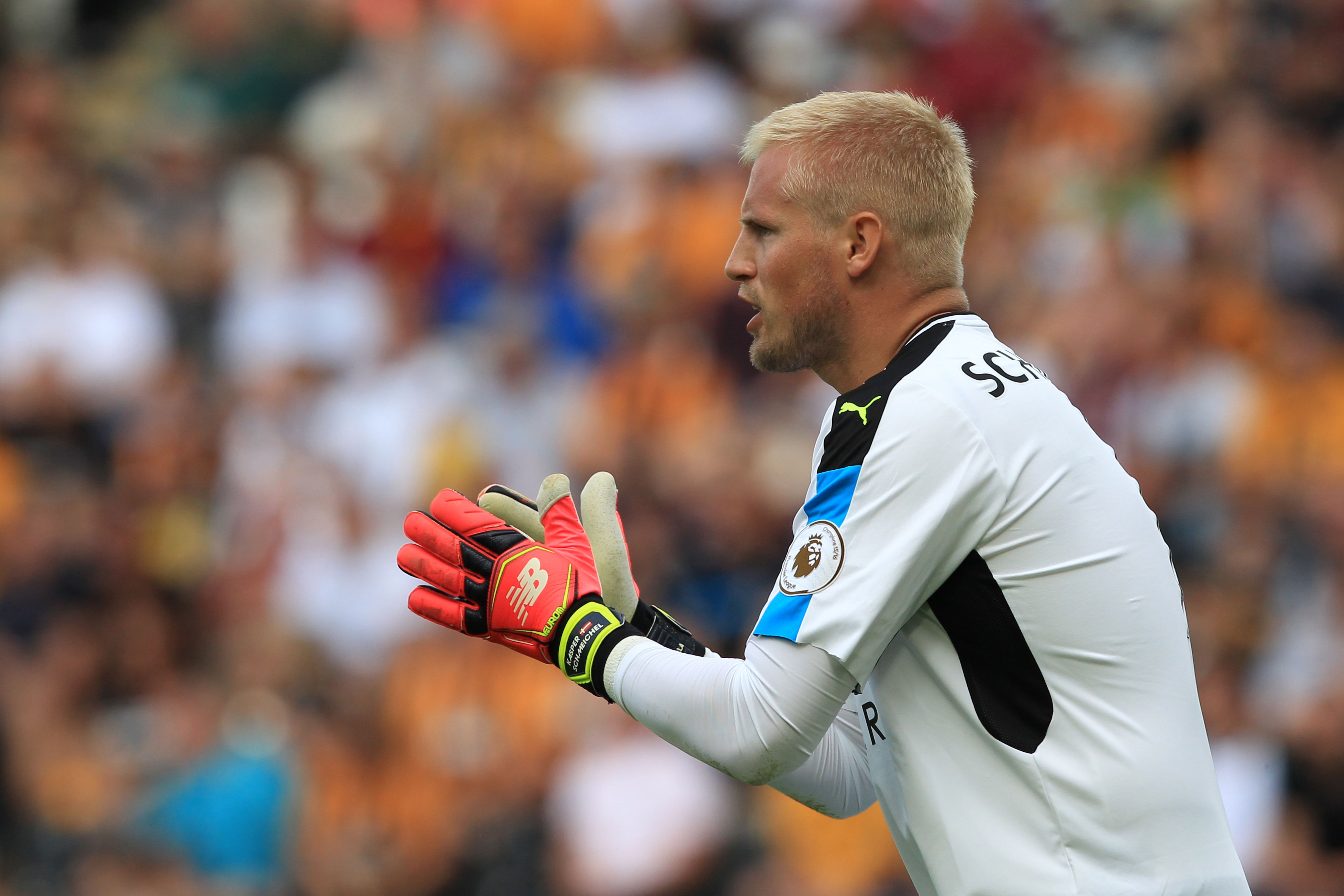 Leicester City's Danish goalkeeper Kasper Schmeichel reacts during the English Premier League football match between Hull City and Leicester City at the KCOM Stadium in Kingston upon Hull, north east England on August 13, 2016.        (Photo credit: Lindsey Parnaby/AFP/Getty Images)