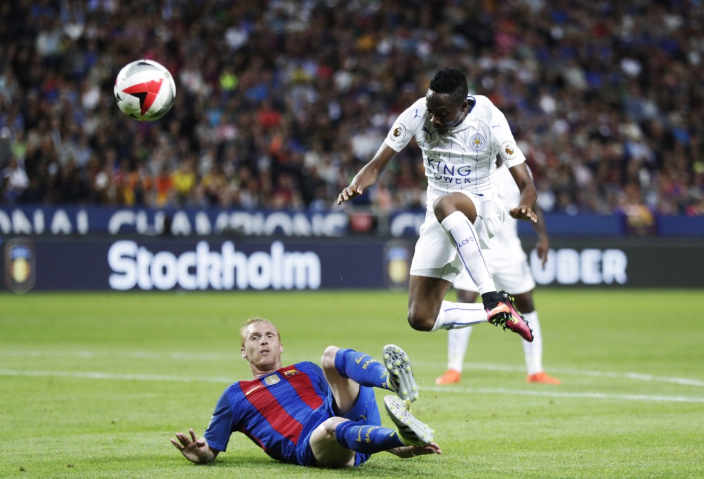 SOLNA, SWEDEN - AUGUST 03:Jeremy Mathieu of FC Barcelona and Ahmed Musa of Leicester City FC 2016 International Champions Cup Leicester City FC and FC Barcelona at Friends arena on August 3, 2016 in Solna, Sweden. (Photo by Nils Petter Nilsson/Ombrello/Getty Images)