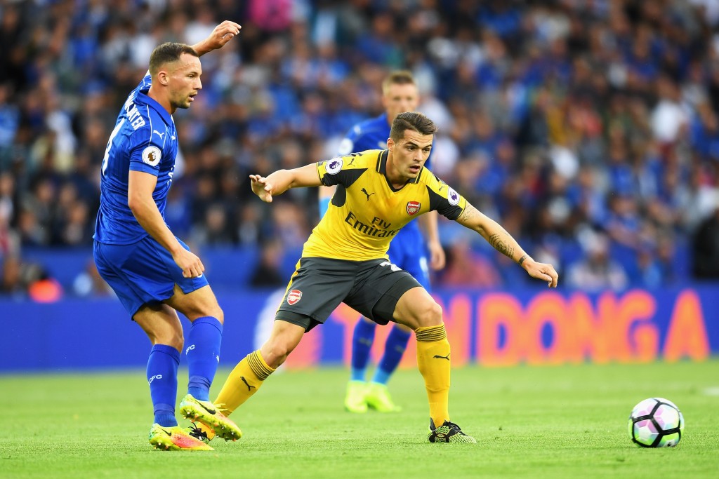 LEICESTER, ENGLAND - AUGUST 20: Daniel Drinkwater of Leicester City and Granit Xhaka of Arsenal watch the ball during the Premier League match between Leicester City and Arsenal at The King Power Stadium on August 20, 2016 in Leicester, England. (Photo by Michael Regan/Getty Images)