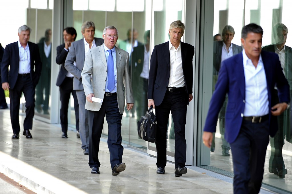 NYON, SWITZERLAND - SEPTEMBER 03: UEFA Elite Club Coaches Forum Chairman Sir Alex Ferguson and Arsenal FC Coach Arsene Wenger arrive for the UEFA Elite Club Coaches Forum at the UEFA headquarters, The House of European Football, on Spetember 3, 2014 in Nyon, Switzerland. (Photo by Harold Cunningham/Getty Images for UEFA)