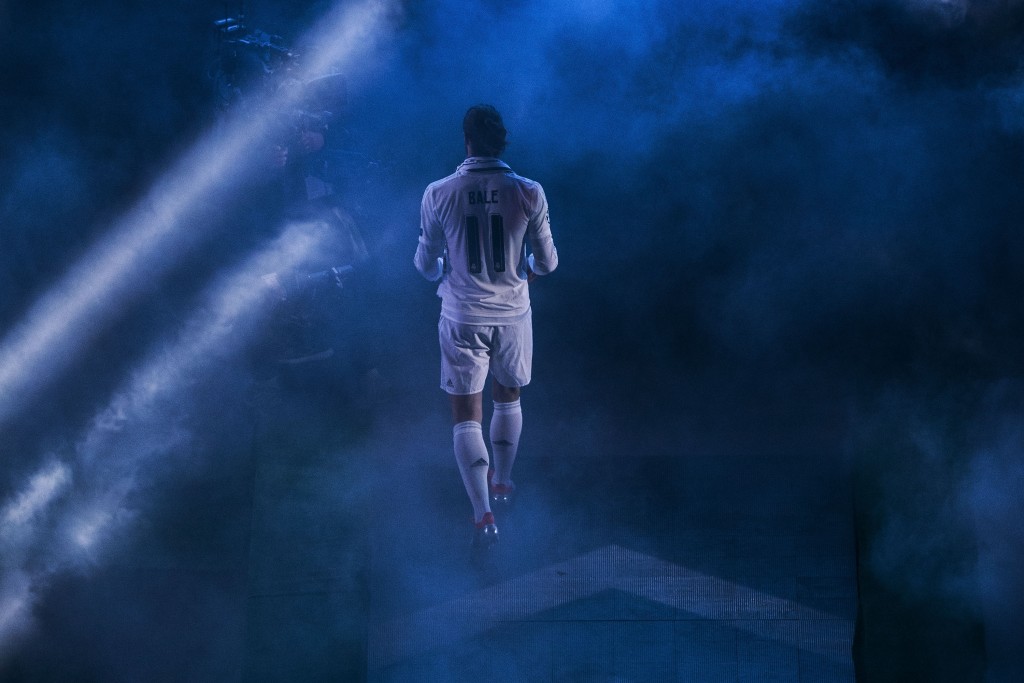 MADRID, SPAIN - MAY 29: Gareth Bale of Real Madrid CF enters the pitch during Real Madrid CF team celebration at Santiago Bernabeu Stadium the day after winning the UEFA Champions League Final match against Club Atletico de Madrid on May 29, 2016 in Madrid, Spain. Real Madrid CF is the only European football team with 11 European Cups (Photo by Gonzalo Arroyo Moreno/Getty Images)