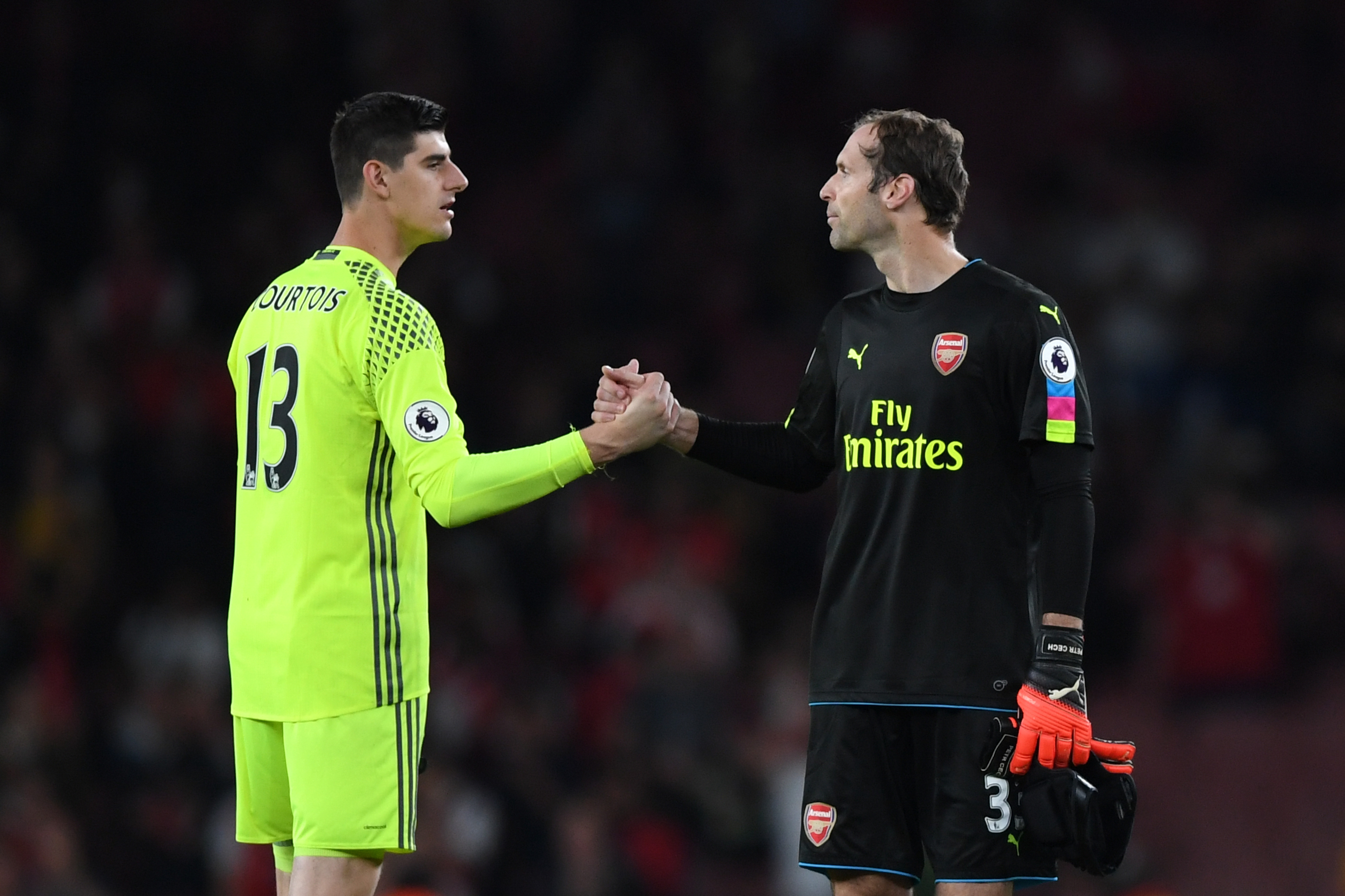 LONDON, ENGLAND - SEPTEMBER 24: Thibaut Courtois of Chelsea (L) and Petr Cech of Arsenal (R) shake hands after the final whistle during the Premier League match between Arsenal and Chelsea at the Emirates Stadium on September 24, 2016 in London, England. (Photo by Shaun Botterill/Getty Images)