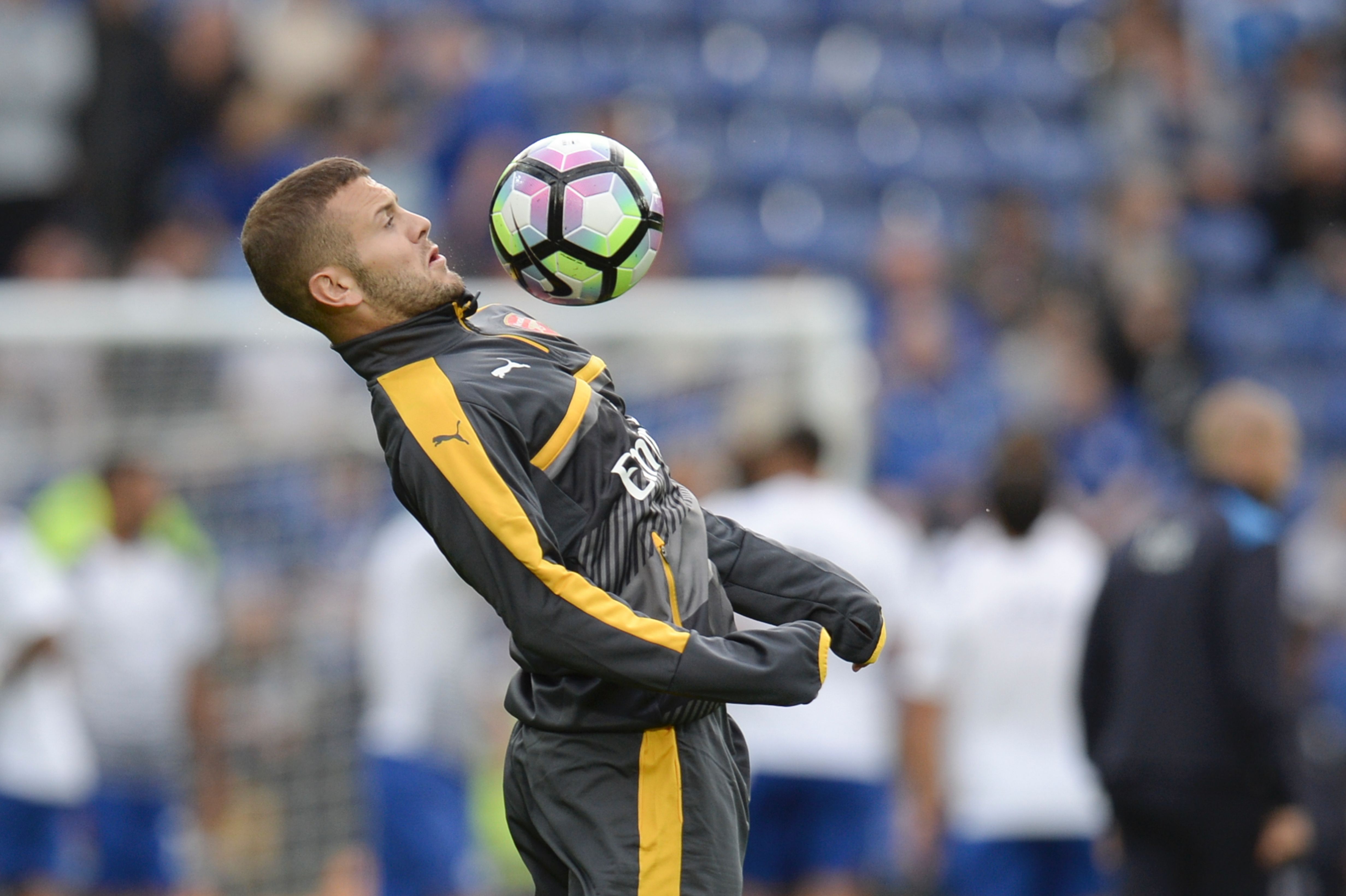 Arsenal's English midfielder Jack Wilshere warms up before the English Premier League football match between Leicester City and Arsenal at King Power Stadium in Leicester, central England on August 20, 2016. / AFP / OLI SCARFF / RESTRICTED TO EDITORIAL USE. No use with unauthorized audio, video, data, fixture lists, club/league logos or 'live' services. Online in-match use limited to 75 images, no video emulation. No use in betting, games or single club/league/player publications. / (Photo credit should read OLI SCARFF/AFP/Getty Images)
