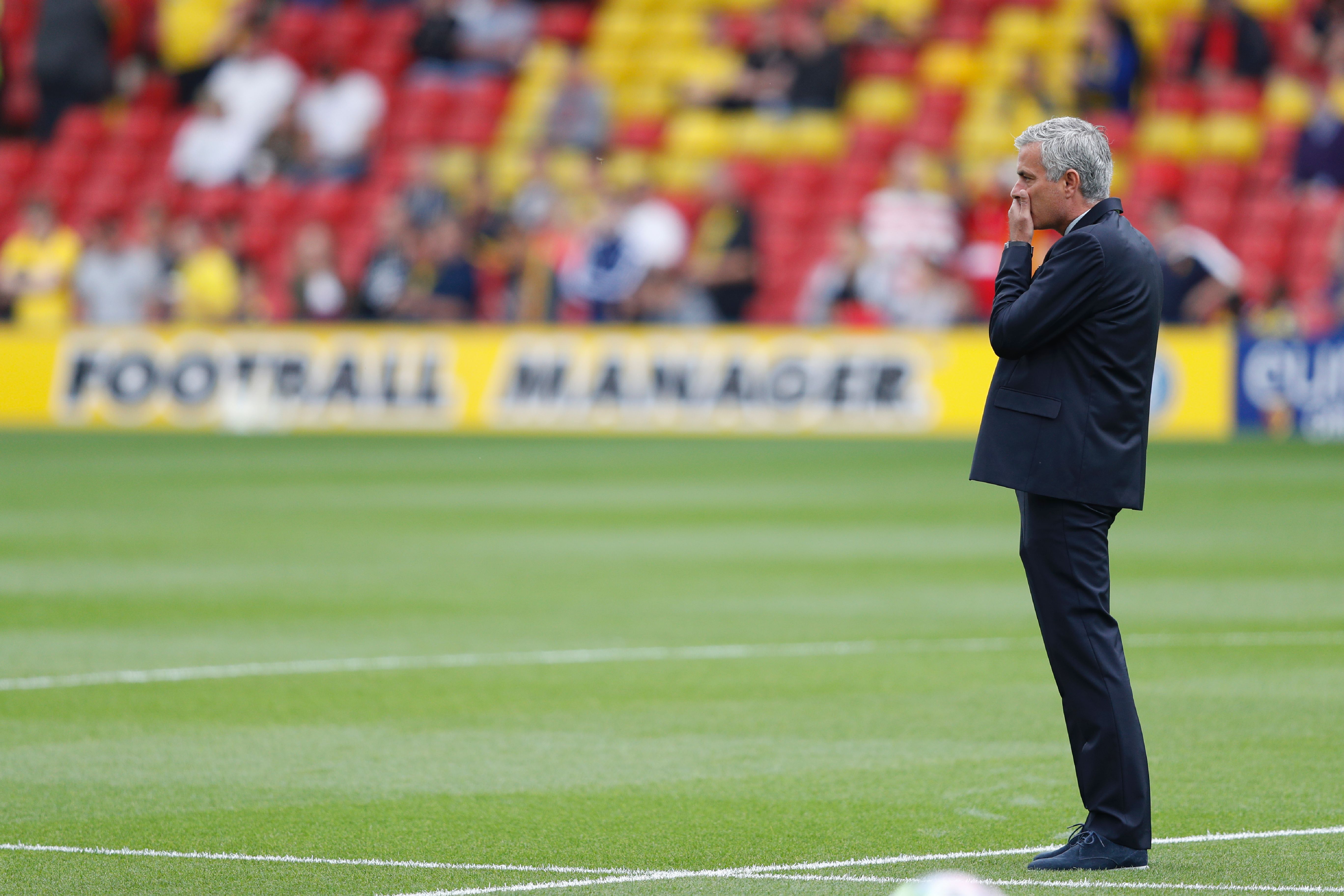 Manchester United's Portuguese manager Jose Mourinho looks on before the English Premier League football match between Watford and Manchester United at Vicarage Road Stadium in Watford, north of London on September 18, 2016. / AFP / Adrian DENNIS / RESTRICTED TO EDITORIAL USE. No use with unauthorized audio, video, data, fixture lists, club/league logos or 'live' services. Online in-match use limited to 75 images, no video emulation. No use in betting, games or single club/league/player publications.  /         (Photo credit should read ADRIAN DENNIS/AFP/Getty Images)