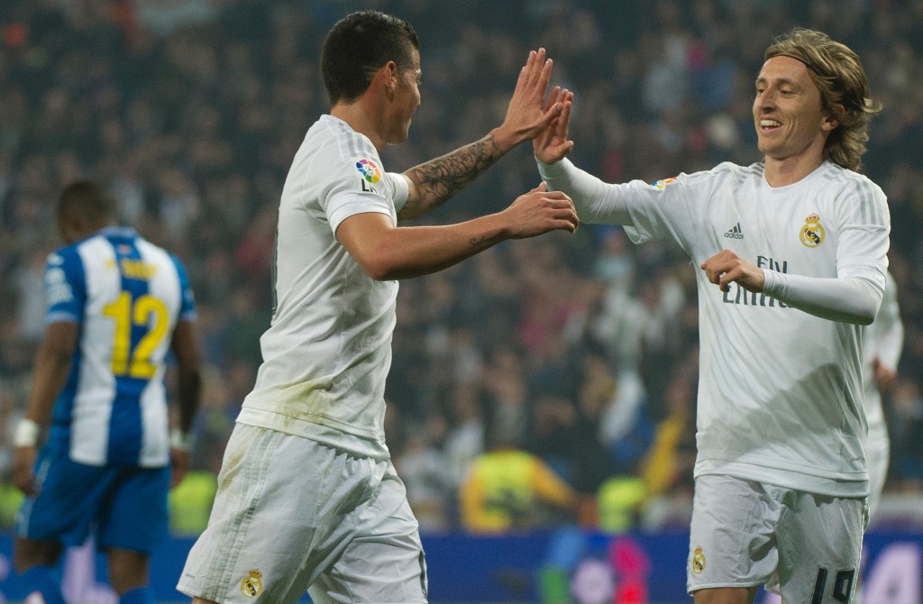 It is likely to be down to the duo of Modric and James Rodriguez to cover up for the absence of Ronaldo and Bale. (Picture Courtesy - AFP/Getty Images)