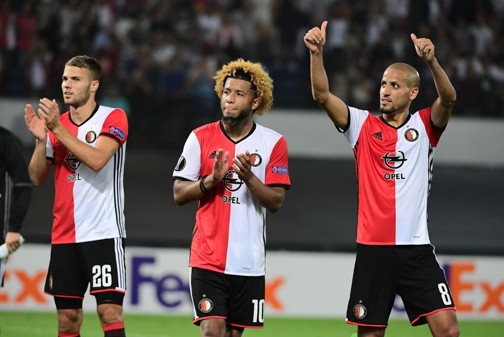 Feyenoord's Bart Nieuwkoop, Feyenoord's Tonny Trindade and Feyenoord's Karim El Ahmadi celebrate after winning at the end of the UEFA Europa League football match between Feyenoord Rotterdam and Manchester United at the Feyenoord Stadium in Rotterdam on September 15, 2016. Feyenoord won the match 1-0. / AFP / EMMANUEL DUNAND (Photo credit should read EMMANUEL DUNAND/AFP/Getty Images)