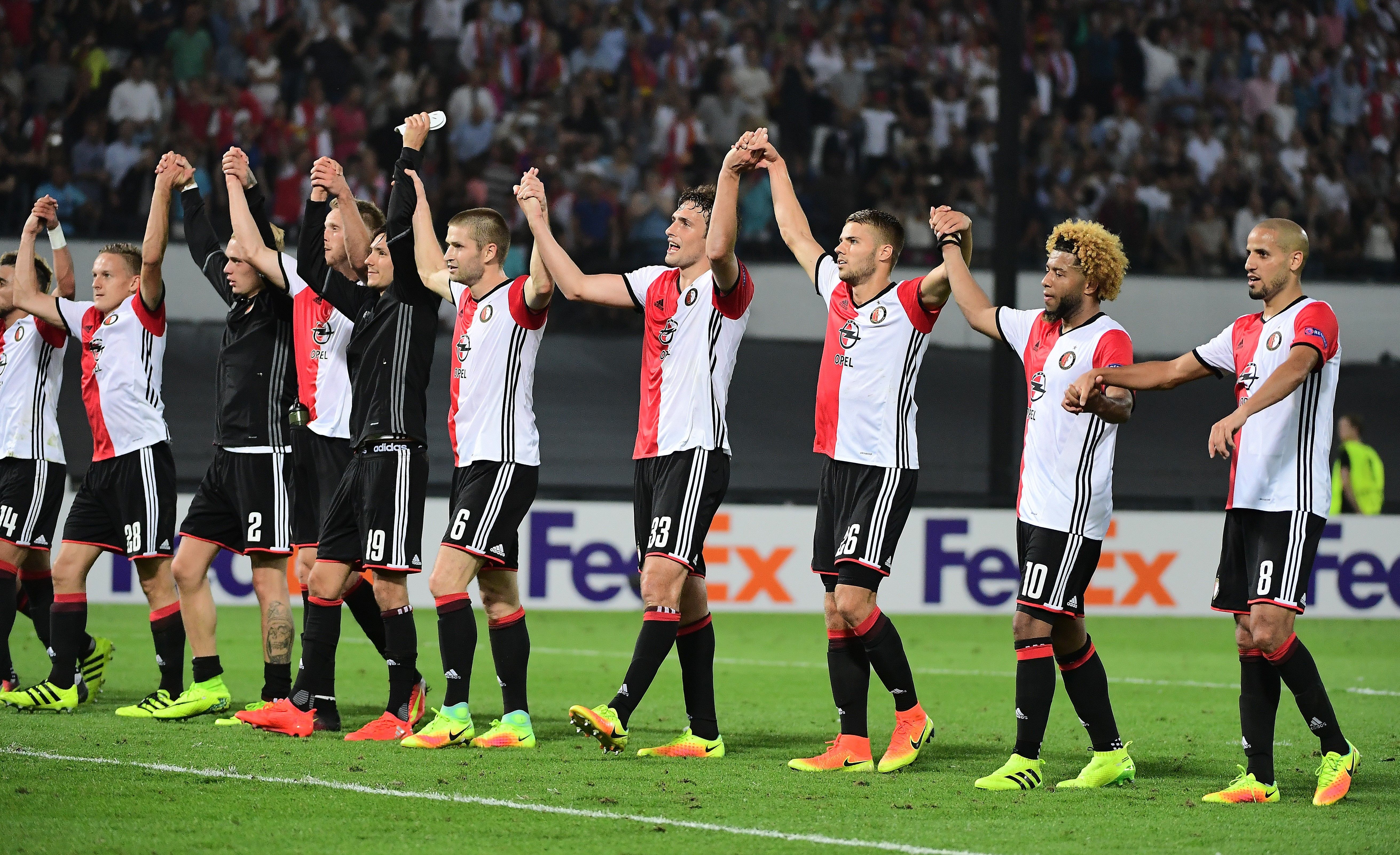 Feyenoord's players celebrate after winning at the end of the UEFA Europa League football match between Feyenoord Rotterdam and Manchester United at the Feyenoord Stadium in Rotterdam on September 15, 2016.
Feyenoord won the match 1-0. / AFP / EMMANUEL DUNAND        (Photo credit should read EMMANUEL DUNAND/AFP/Getty Images)