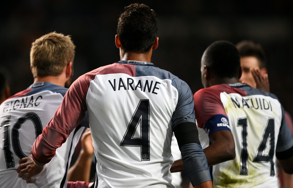 Raphael Varane took a tough decision and 'turned his back on his mentor' Jose Mourinho to stay and fight for his place at Santiago Bernabeu. (Picture Courtesy - AFP/Getty Images)