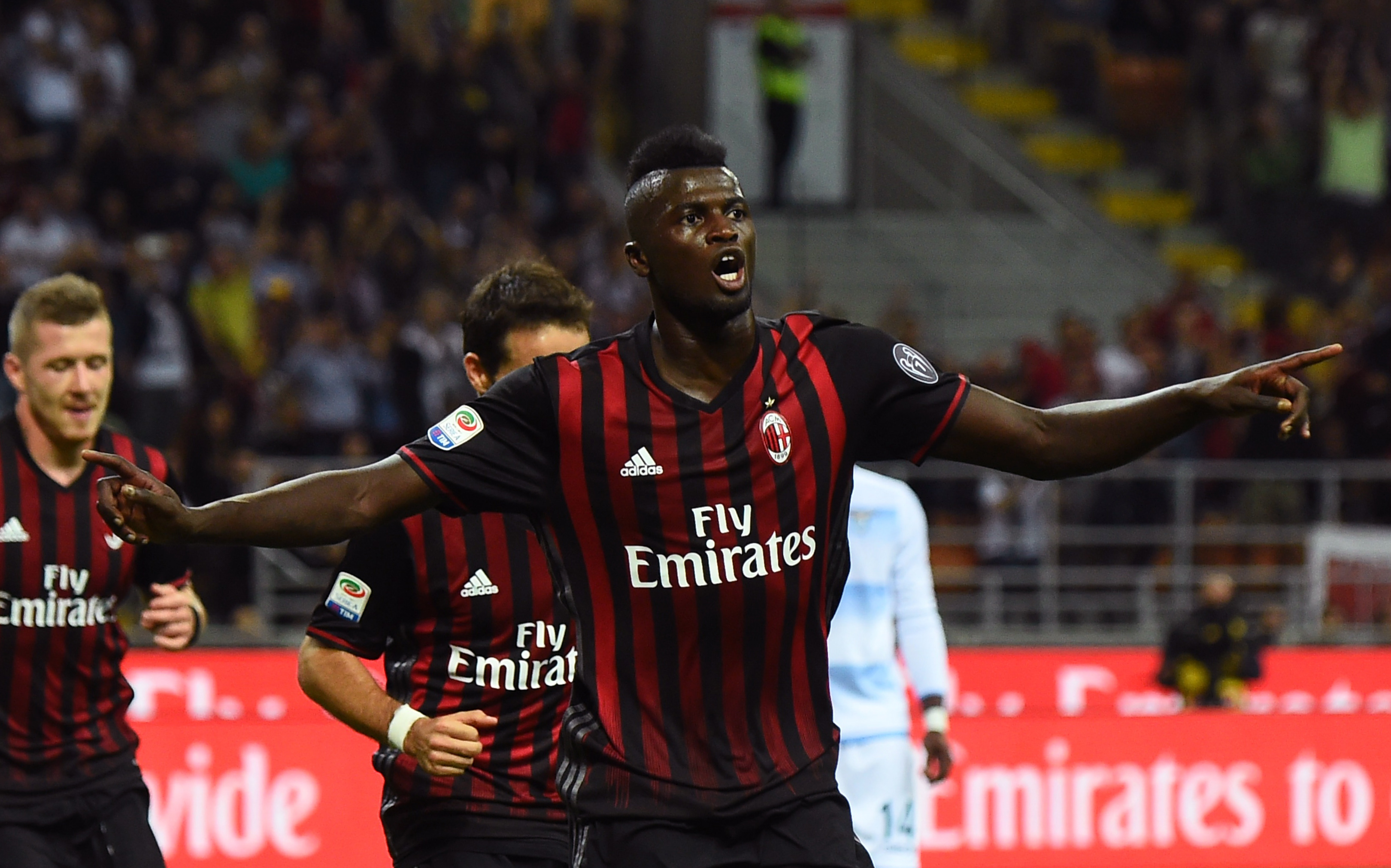 AC Milan's French forward from France Mbaye Niang celebrates after scoring a goal during the Italian Serie A football match between AC Milan and SS Lazio at the San Siro Stadium in Milan, on September 20, 2016. (Photo by Giuseppe Cacace/AFP/Getty Images)