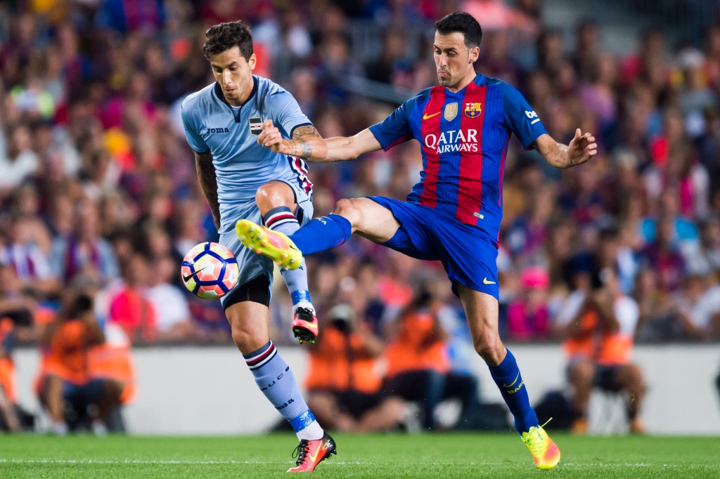 BARCELONA, SPAIN - AUGUST 10: Sergio Busquets (R) of FC Barcelona and Ricardo Gabriel Alvarez of UC Sampdoria fight for the ball during the Joan Gamper trophy match between FC Barcelona and UC Sampdoria at Camp Nou on August 10, 2016 in Barcelona, Spain. (Photo by Alex Caparros/Getty Images)