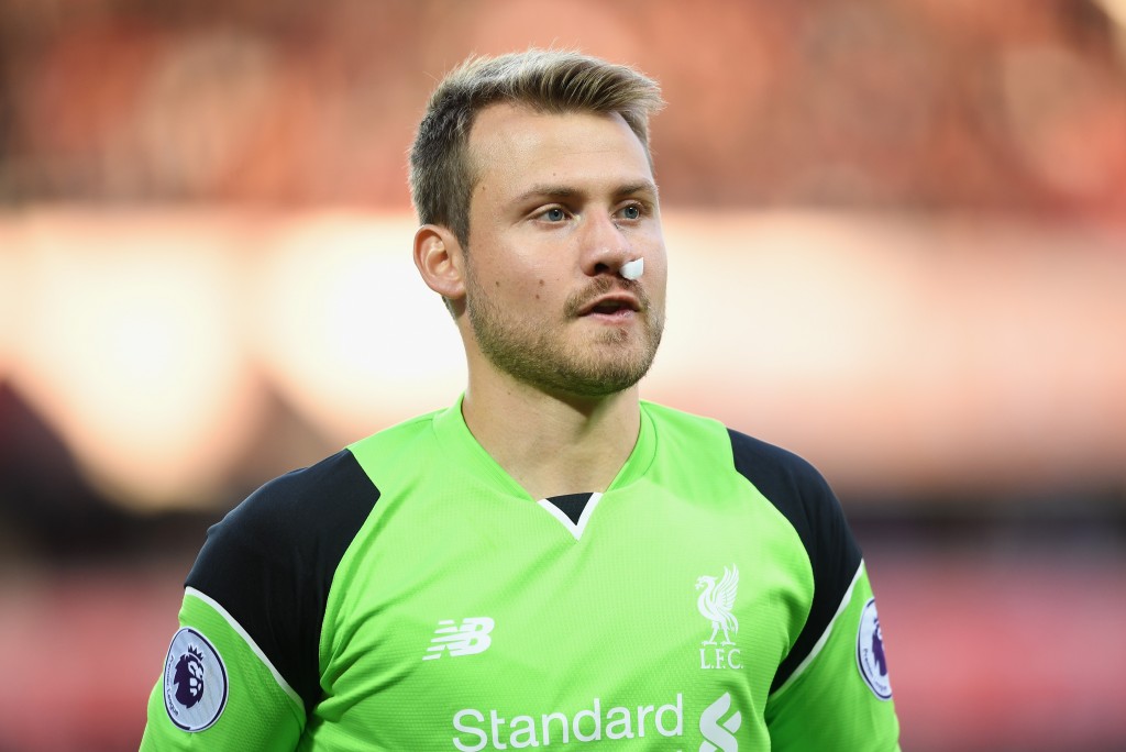 LIVERPOOL, ENGLAND - SEPTEMBER 10: Simon Mignolet of Liverpool looks on following an injury during the Premier League match between Liverpool and Leicester City at Anfield on September 10, 2016 in Liverpool, England. (Photo by Michael Regan/Getty Images)