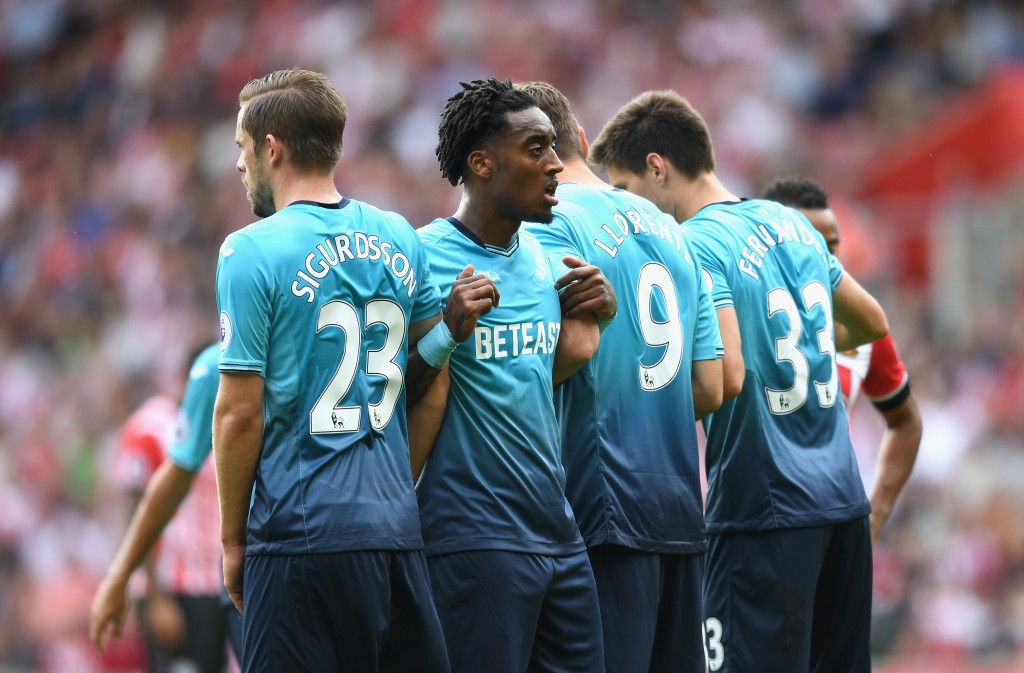 The Swansea wall could just prove to be Manchester City's undoing and the Welsh club could just be the first club to defeat Guardiola in England. (Picture Courtesy - AFP/Getty Images)