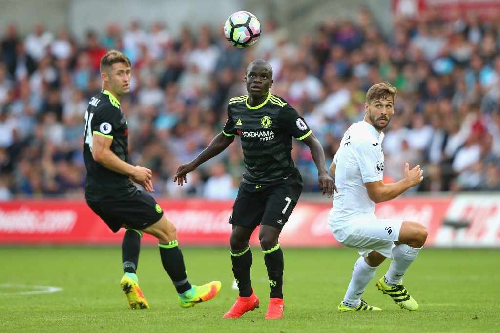 SWANSEA, WALES - SEPTEMBER 11: (L-R) Gary Cahill and N'Golo Kante of Chelsea and Fernando Llorente of Swansea City watch the ball during the Premier League match between Swansea City and Chelsea at Liberty Stadium on September 11, 2016 in Swansea, Wales. (Photo by Alex Livesey/Getty Images)
