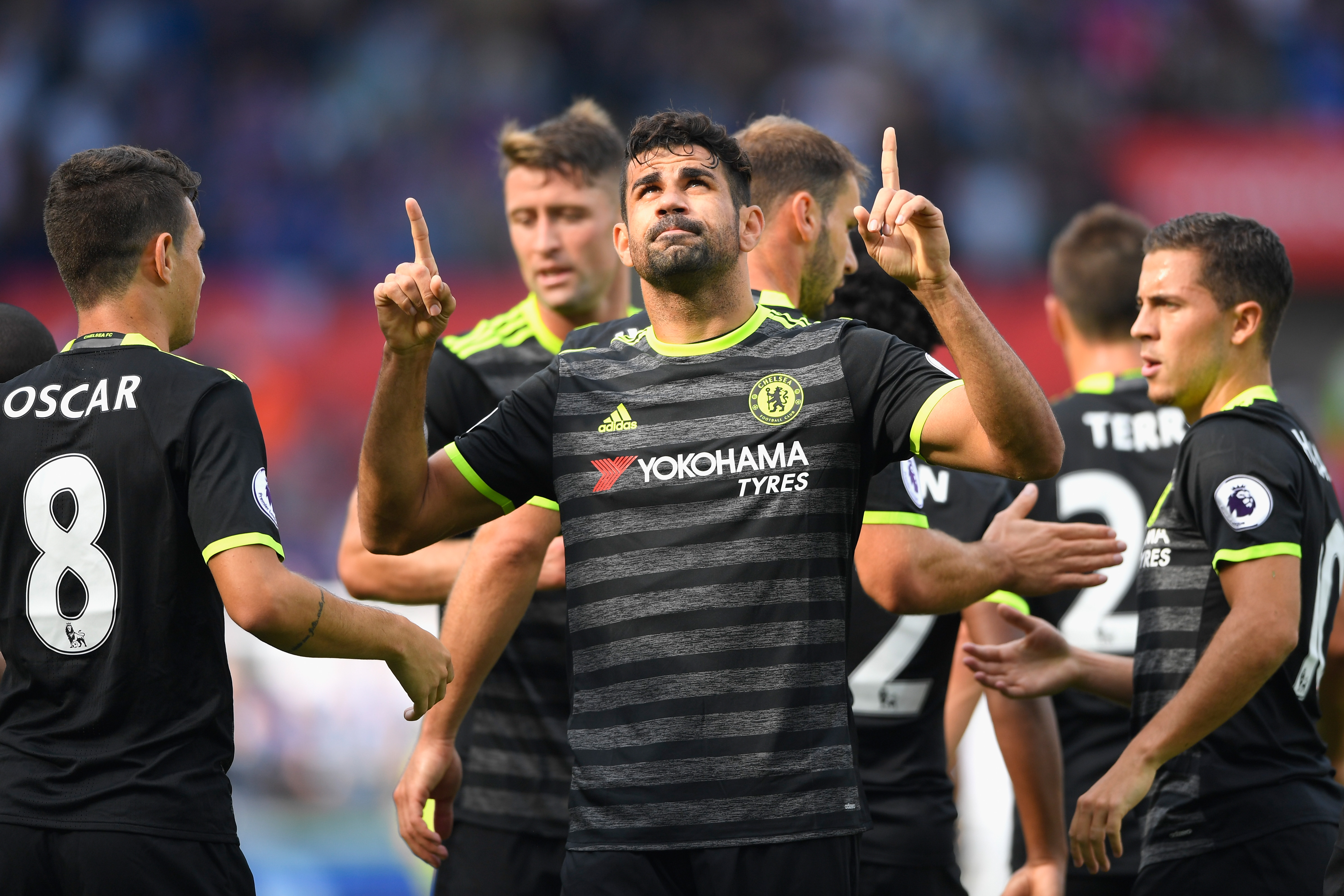 SWANSEA, WALES - SEPTEMBER 11:  Diego Costa of Chelsea (C) celebrates with team mates as he scores their first goal during the Premier League match between Swansea City and Chelsea at Liberty Stadium on September 11, 2016 in Swansea, Wales.  (Photo by Stu Forster/Getty Images)