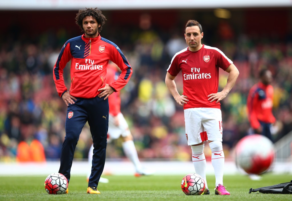 LONDON, ENGLAND - APRIL 30: Mohamed Elneny (L) and Santi Cazorla of Arsenal are seen during the warm up prior to the Barclays Premier League match between Arsenal and Norwich City at The Emirates Stadium on April 30, 2016 in London, England (Photo by Paul Gilham/Getty Images)