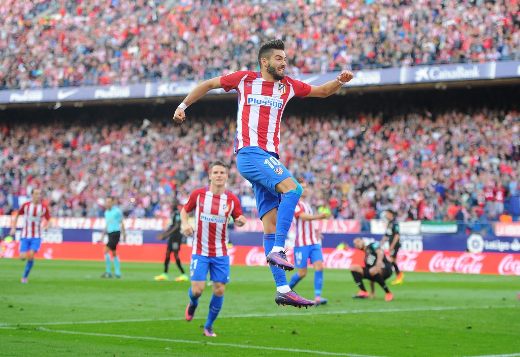 MADRID, SPAIN - OCTOBER 15: Yannick Carrasco of Club Atletico de Madrid celebrates after scoring his team's opning goal during the La Liga match between Club Atletico de Madrid and Granada CF at Vicente Calderon Stadium on October 15, 2016 in Madrid, Spain. (Photo by Denis Doyle/Getty Images)