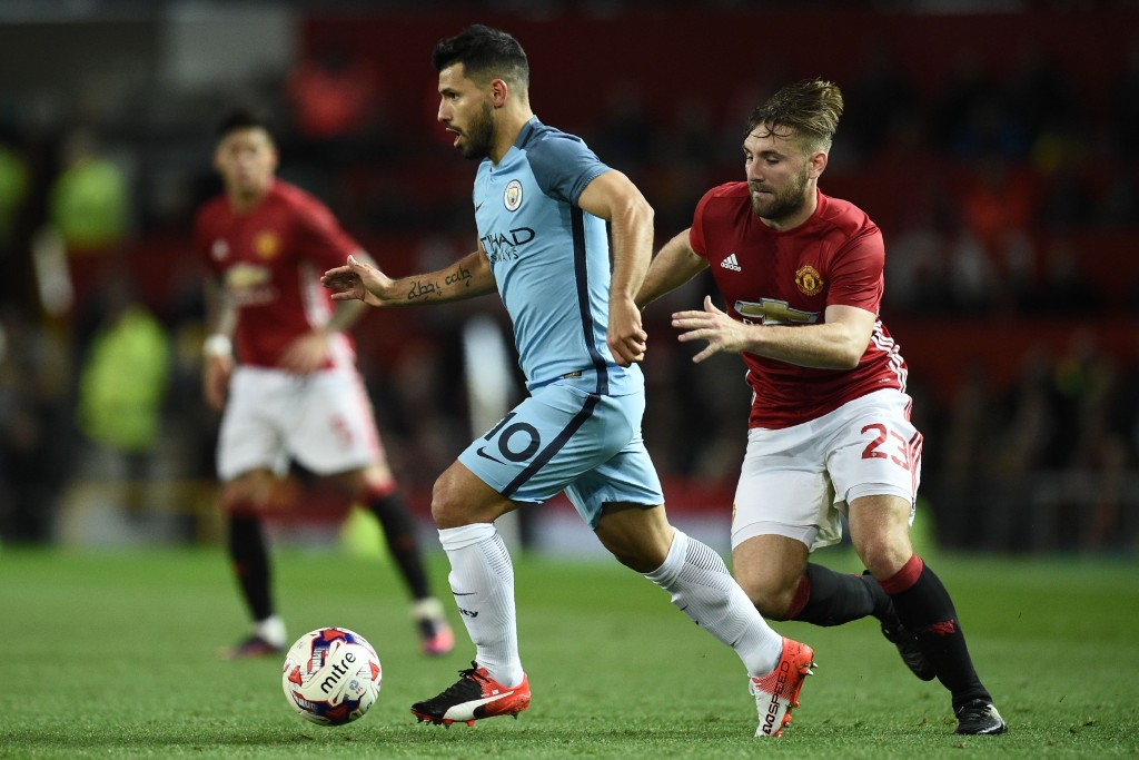Manchester City's Argentinian striker Sergio Aguero (L) vies with Manchester United's English defender Luke Shaw during the EFL (English Football League) Cup fourth round match between Manchester United and Manchester City at Old Trafford in Manchester, north west England on October 26, 2016. Manchester United won the game 1-0. (Photo by Oli Scarff/AFP/Getty Images)