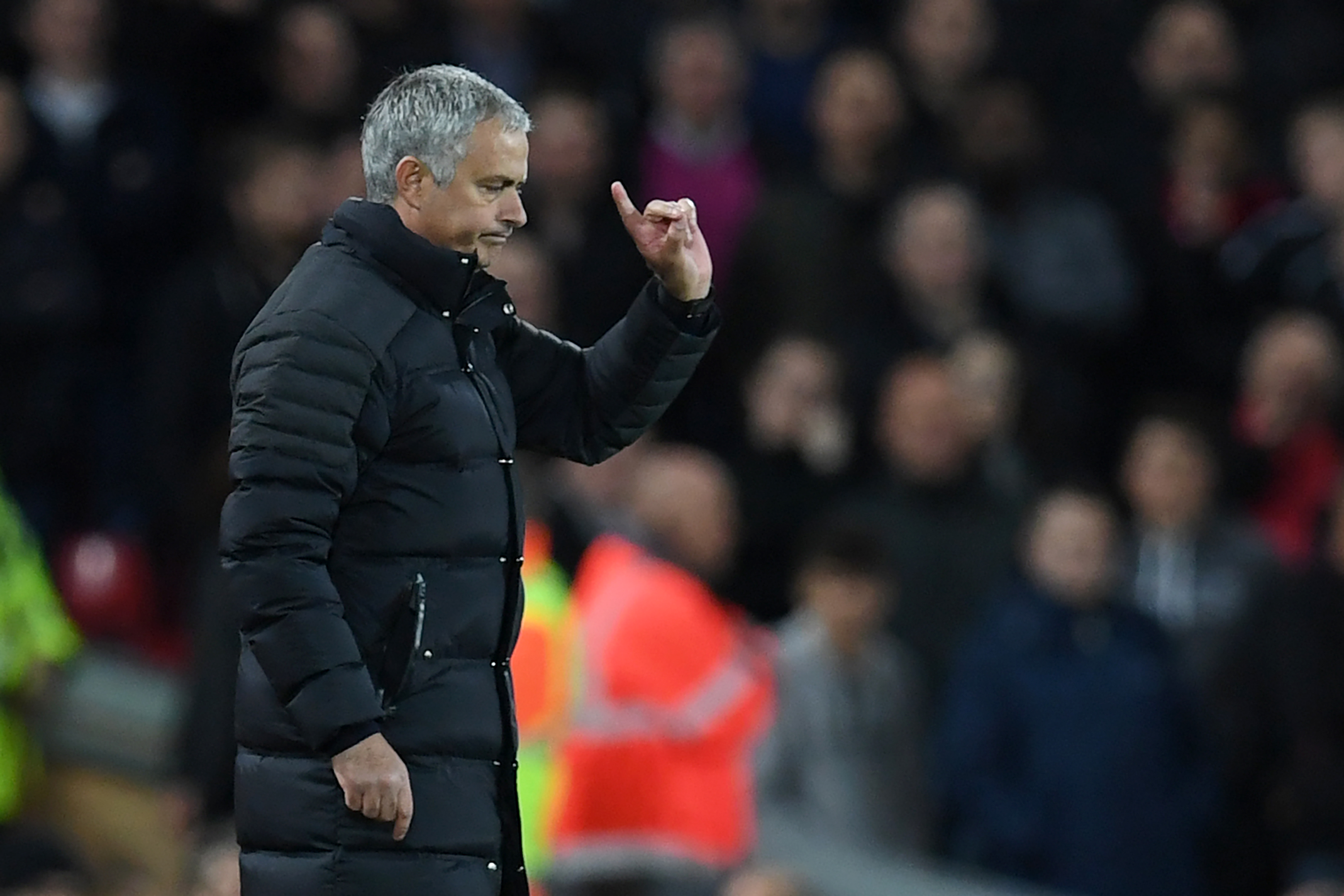 Manchester United's Portuguese manager Jose Mourinho gestures to the referee during the English Premier League football match between Liverpool and Manchester United at Anfield in Liverpool, north west England on October 17, 2016. / AFP / Paul ELLIS / RESTRICTED TO EDITORIAL USE. No use with unauthorized audio, video, data, fixture lists, club/league logos or 'live' services. Online in-match use limited to 75 images, no video emulation. No use in betting, games or single club/league/player publications. / (Photo credit should read PAUL ELLIS/AFP/Getty Images)