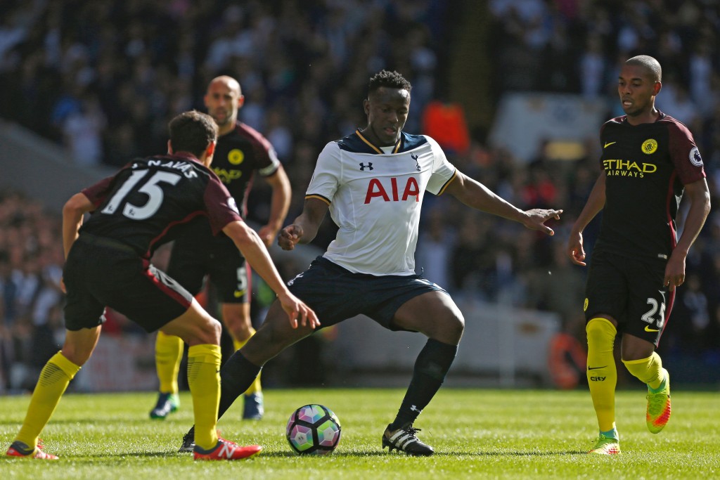 Tottenham Hotspur's Kenyan midfielder Victor Wanyama (2nd R) vies with Manchester City's Spanish midfielder Jesus Navas (L) and Manchester City's Brazilian midfielder Fernandinho (R) during the English Premier League football match between Tottenham Hotspur and Manchester City at White Hart Lane in London, on October 2, 2016. / AFP / IKIMAGES / Ian KINGTON / RESTRICTED TO EDITORIAL USE. No use with unauthorized audio, video, data, fixture lists, club/league logos or 'live' services. Online in-match use limited to 75 images, no video emulation. No use in betting, games or single club/league/player publications. / (Photo credit should read IAN KINGTON/AFP/Getty Images)