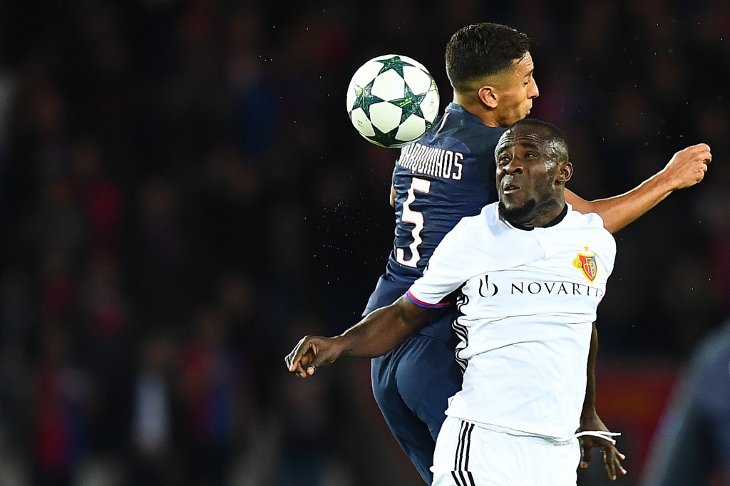 Basel's Ivorian striker Seydou Doumbia (L) heads the ball with Paris Saint-Germain's Brazilian defender Marquinhos during the UEFA Champions League group A football match between Paris Saint-Germain (PSG) and Basel at the Parc des Princes stadium in Paris on October 19, 2016. / AFP / FRANCK FIFE (Photo credit should read FRANCK FIFE/AFP/Getty Images)