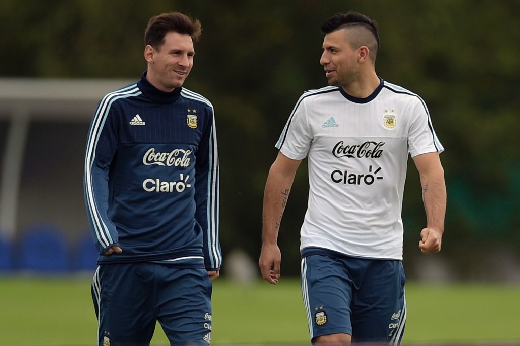 Argentina's footballers Lionel Messi (L) and Sergio Aguero walk during a training session in Ezeiza, Buenos Aires, on March 25, 2016 ahead of their March 29 Russia 2018 FIFA World Cup South American qualifier football match against Bolivia. AFP PHOTO / EITAN ABRAMOVICH / AFP / EITAN ABRAMOVICH (Photo credit should read EITAN ABRAMOVICH/AFP/Getty Images)