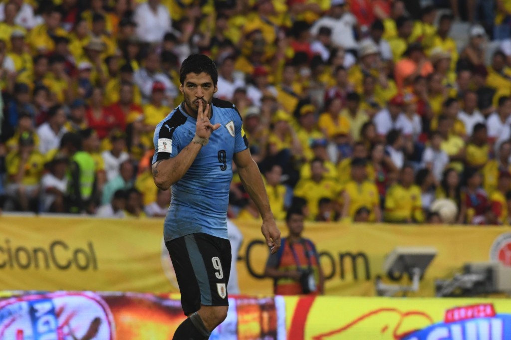 Uruguay's Luis Suarez celebrates after scoring against Colombia during their Russia 2018 World Cup qualifier football match in Barranquilla, Colombia, on October 11, 2016. / AFP / Luis Acosta (Photo credit should read LUIS ACOSTA/AFP/Getty Images)
