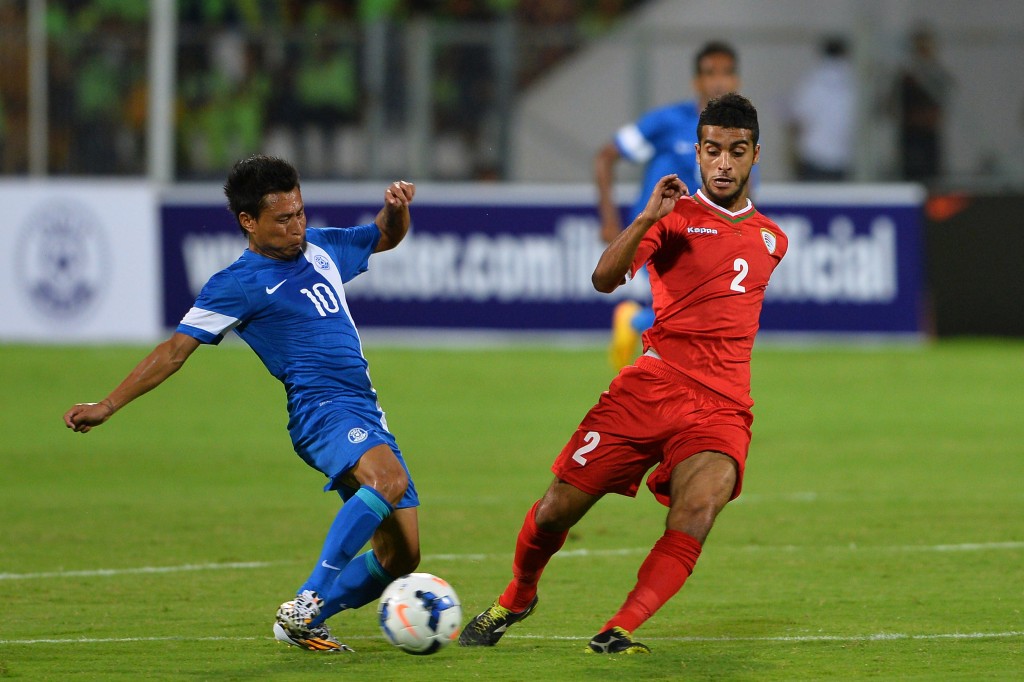 India's midfielder Jackichand Singh Talem (L) and Oman's defender Mohammed Al Musalami vie for the ball during the Asia Group D FIFA World Cup 2018 qualifying football match between India and Oman at Kanteerawa Stadium in Bangalore on June 11, 2015. AFP PHOTO / MANJUNATH KIRAN (Photo credit should read MANJUNATH KIRAN/AFP/Getty Images)
