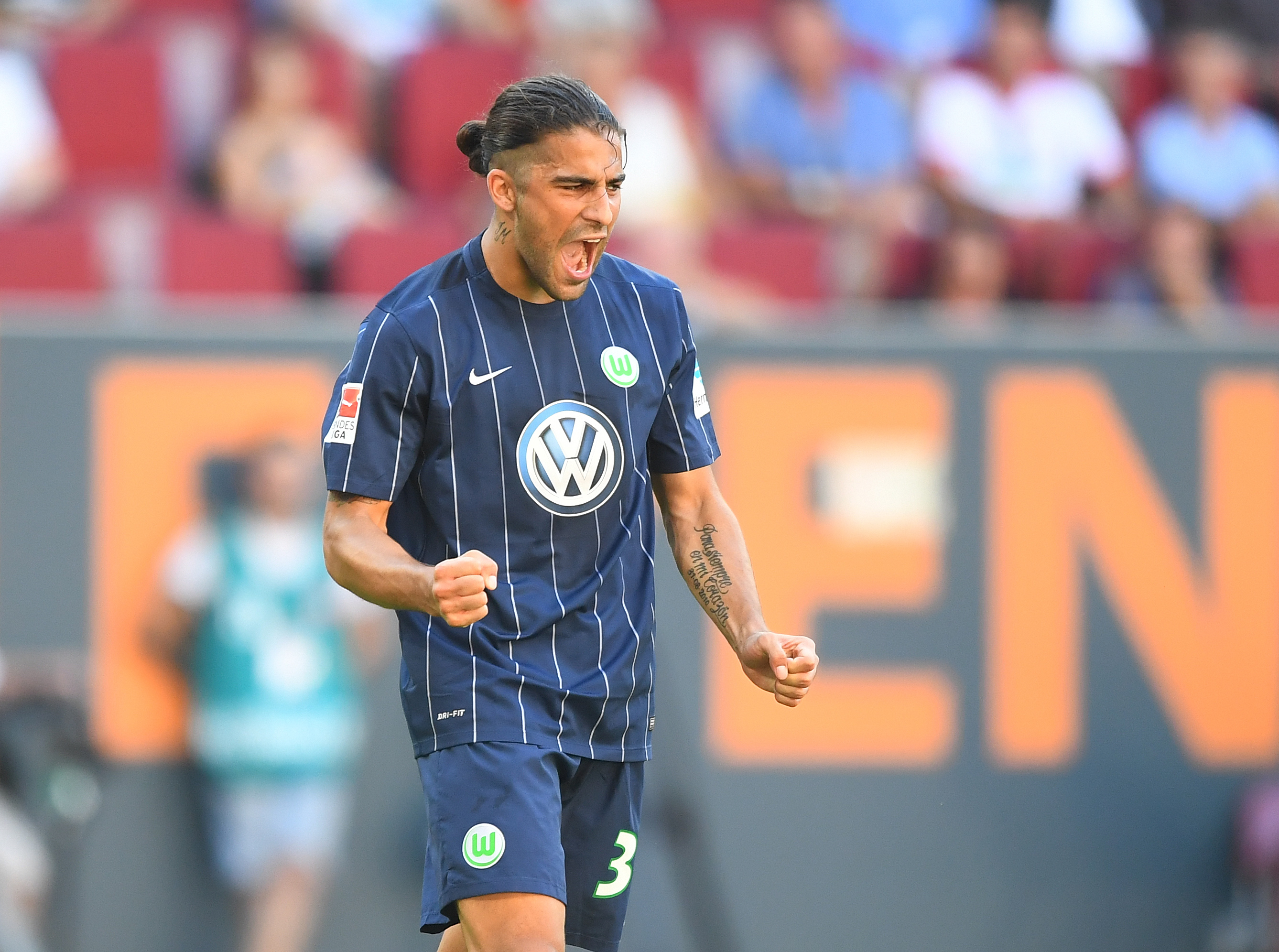 AUGSBURG, GERMANY - AUGUST 27: Ricardo Rodriguez of VfL Wolfsburg celebrates his team's second goal during the Bundesliga match between FC Augsburg and VfL Wolfsburg at WWK Arena on August 27, 2016 in Augsburg, Germany. (Photo by Lennart Preiss/Bongarts/Getty Images)