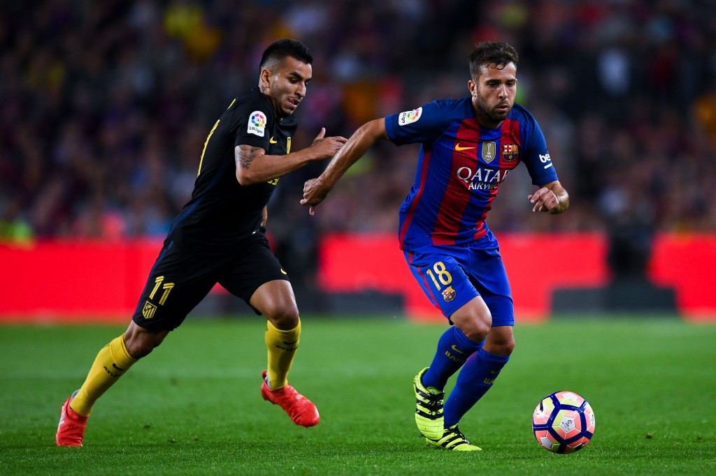 BARCELONA, SPAIN - SEPTEMBER 21: Jordi Alba of FC Barcelona competes for the ball with Angel Correa of Club Atletico de Madrid during the La Liga match between FC Barcelona and Club Atletico de Madrid at the Camp Nou stadium on September 21, 2016 in Barcelona, Spain. (Photo by David Ramos/Getty Images)