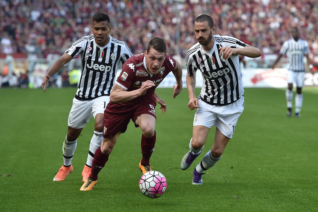 TURIN, ITALY - MARCH 20: Andrea Belotti (C) of Torino FC in action against Leonardo Bonucci (R) and Alex Sandro of Juventus FC during the Serie A match between Torino FC and Juventus FC at Stadio Olimpico di Torino on March 20, 2016 in Turin, Italy. (Photo by Valerio Pennicino/Getty Images)