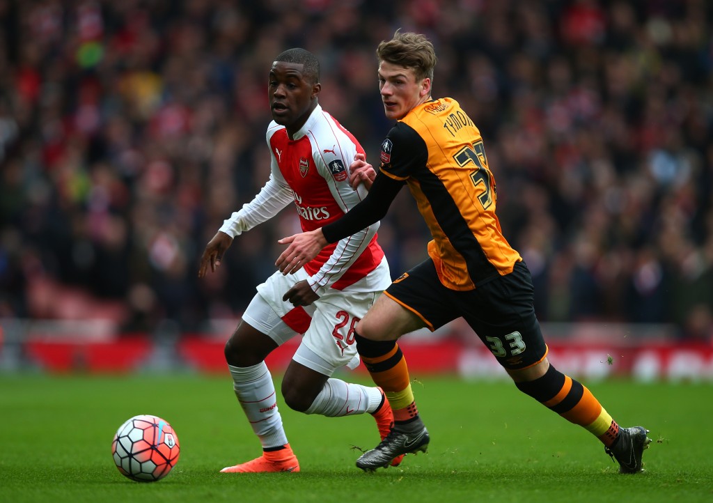 LONDON, ENGLAND - FEBRUARY 20: Joel Campbell of Arsenal and Josh Tymon of Hull City compete for the ball during the Emirates FA Cup fifth round match between Arsenal and Hull City at the Emirates Stadium on February 20, 2016 in London, England. (Photo by Clive Rose/Getty Images)
