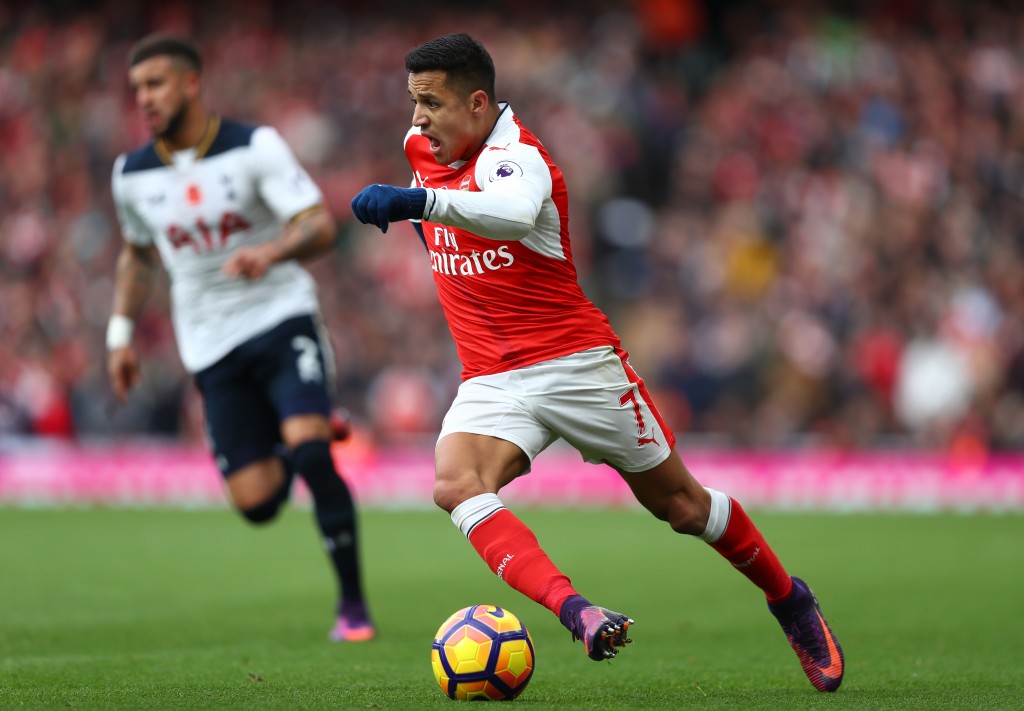 LONDON, ENGLAND - NOVEMBER 06: Alexis Sanchez of Arsenal in action during the Premier League match between Arsenal and Tottenham Hotspur at Emirates Stadium on November 6, 2016 in London, England. (Photo by Clive Rose/Getty Images)