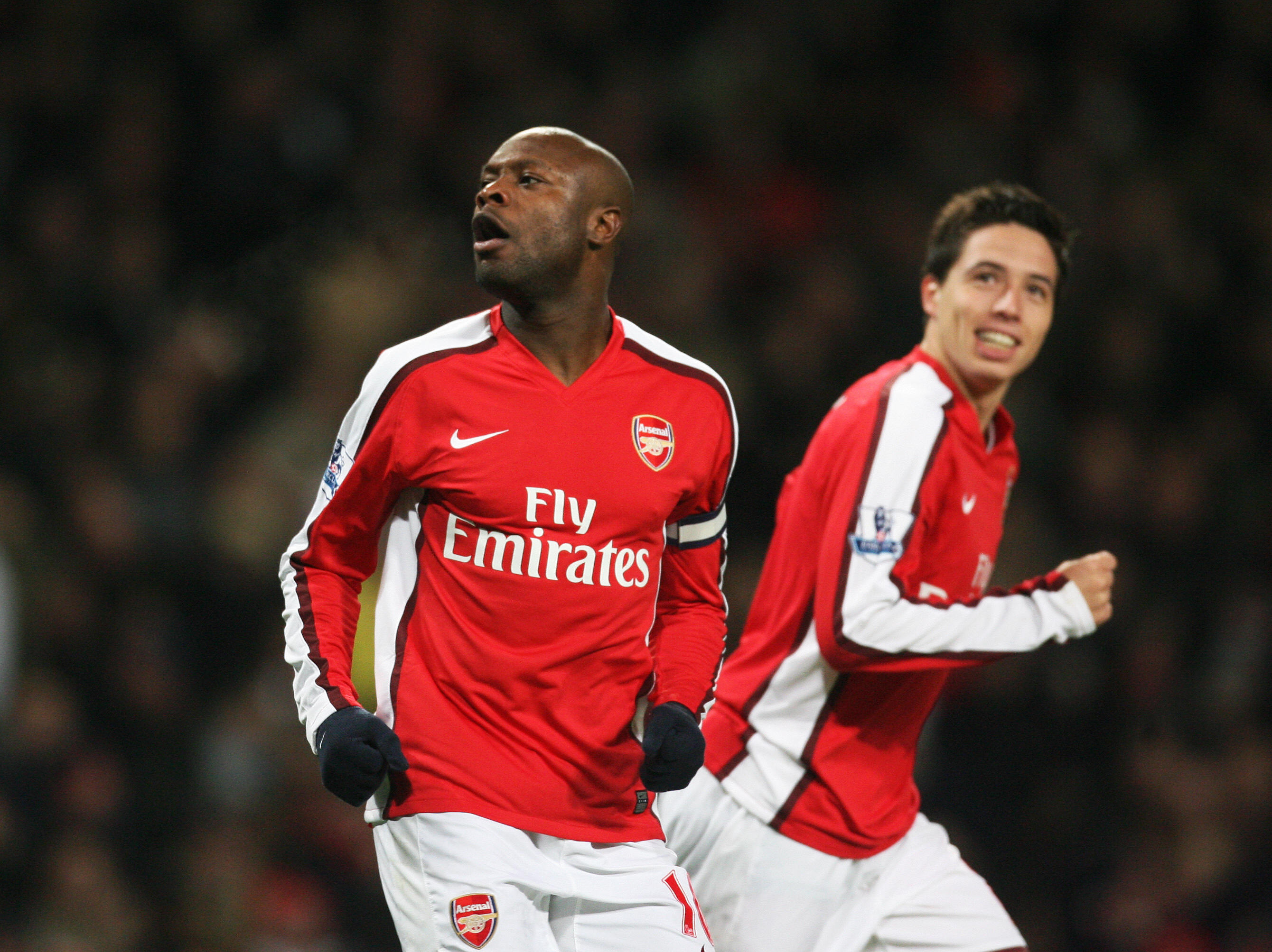 Arsenal's William Gallas celebrates scoring the goal to make it 2-1 against Tottenham Hotspur with Samir Nasri (R) during their Barclays Premiership football match at The Emirates Stadium in London, on October 29, 2008. AFP PHOTO/Chris Ratcliffe Mobile and website use of domestic English football pictures are subject to obtaining a Photographic End User Licence from Football DataCo Ltd Tel : +44 (0) 207 864 9121 or e-mail accreditations@football-dataco.com - applies to Premier and Football League matches. (Photo credit should read CHRIS RATCLIFFE/AFP/Getty Images)