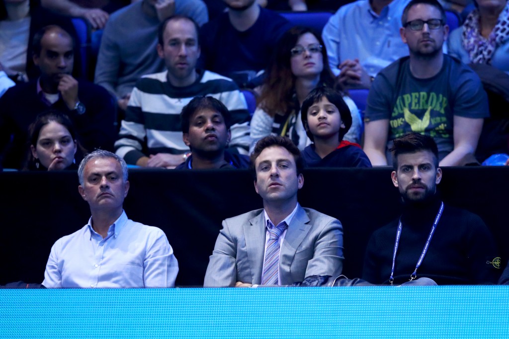 LONDON, ENGLAND - NOVEMBER 13: Gerard Pique of Barcelona and Jose Mourinho, manager of Manchester United watch the men's single match between Novak Djokovic of Serbia and Dominic Thiem of Austria on day one of the ATP World Tour Finals at O2 Arena on November 13, 2016 in London, England. (Photo by Clive Brunskill/Getty Images)