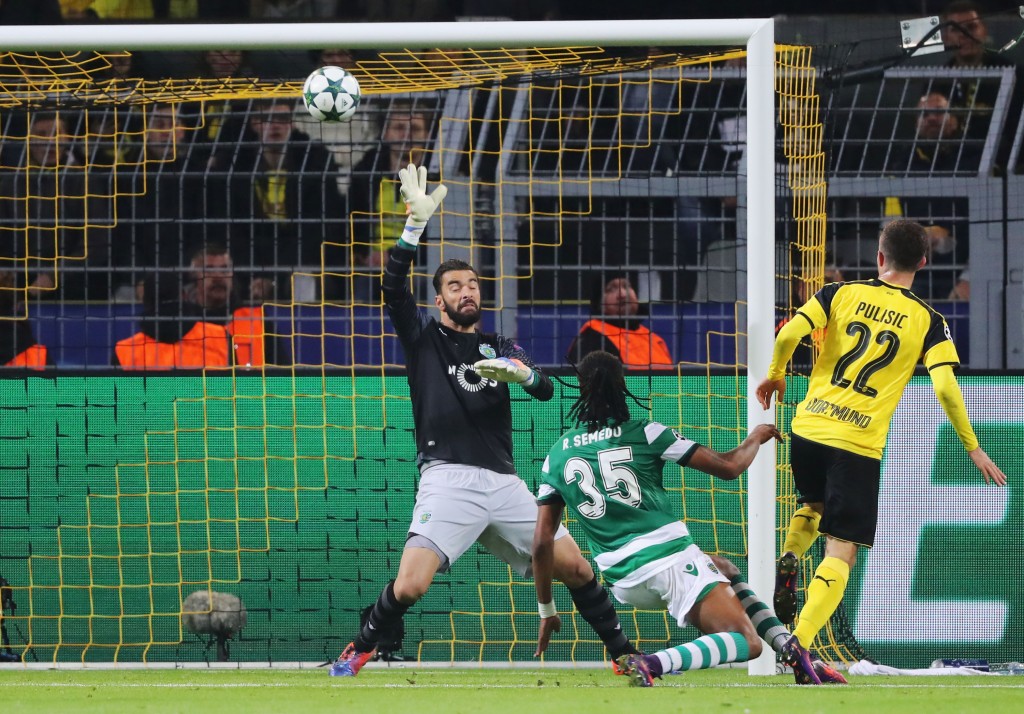 DORTMUND, GERMANY - NOVEMBER 02: Christian Pulisic of Borussia Dortmund (22) hits the crosssbar as he shoots past Rui Patricio of Sporting CP during the UEFA Champions League Group F match between Borussia Dortmund and Sporting Clube de Portugal at Signal Iduna Park on November 2, 2016 in Dortmund, Germany. (Photo by Simon Hofmann/Bongarts/Getty Images)