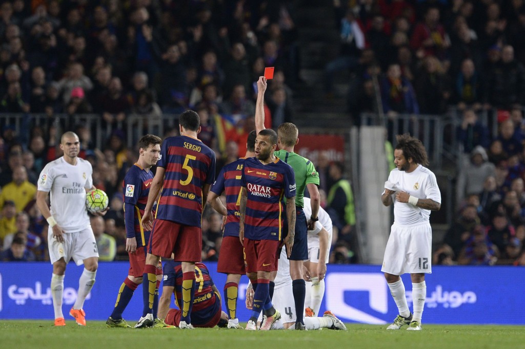 Real Madrid's defender Sergio Ramos is shown a red card by the referee during the Spanish league "Clasico" football match FC Barcelona vs Real Madrid CF at the Camp Nou stadium in Barcelona on April 2, 2016. (Photo credit - Josep Lago/AFP/Getty Images)
