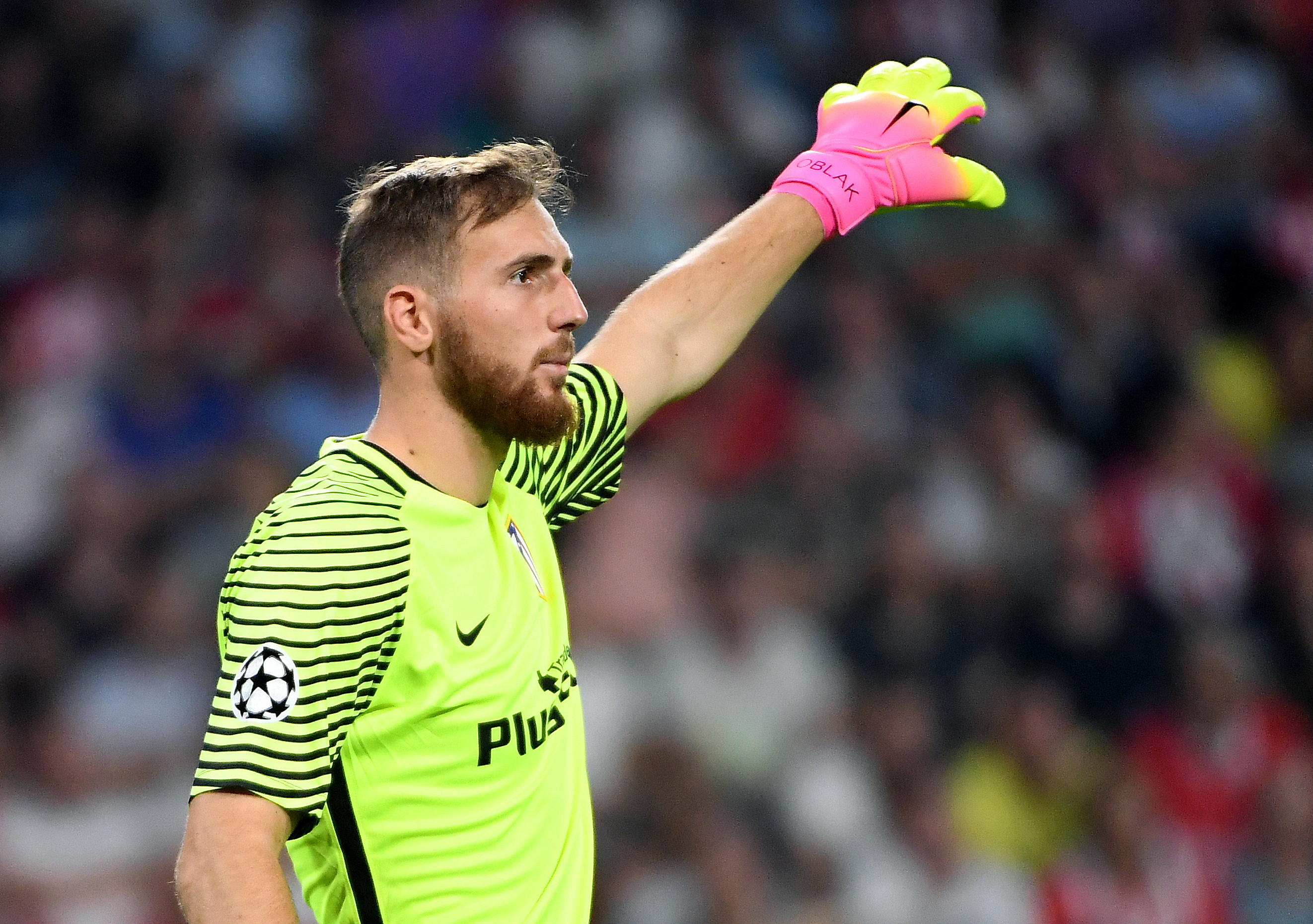 Atletico Madrid's Slovenian goalkeeper Jan Oblak gestures during the UEFA Champions League football match between PSV Eindhoven and Atletico Madrid at Philips Stadium on September 13, 2016, in Eindhoven, The Netherlands. / AFP / EMMANUEL DUNAND (Photo credit should read EMMANUEL DUNAND/AFP/Getty Images)