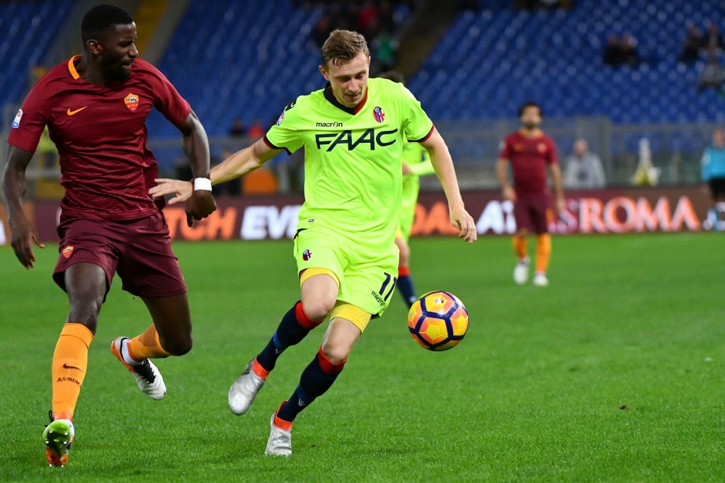 AS Roma's German defender Antonio Rudiger (L) vies Bologna's midfielder from Czech Republic Ladislav Krejci during the Italian Serie A football match AS Roma vs Bologna at the Olympic stadium in Rome, on November 6, 2016. / AFP / VINCENZO PINTO (Photo credit should read VINCENZO PINTO/AFP/Getty Images)