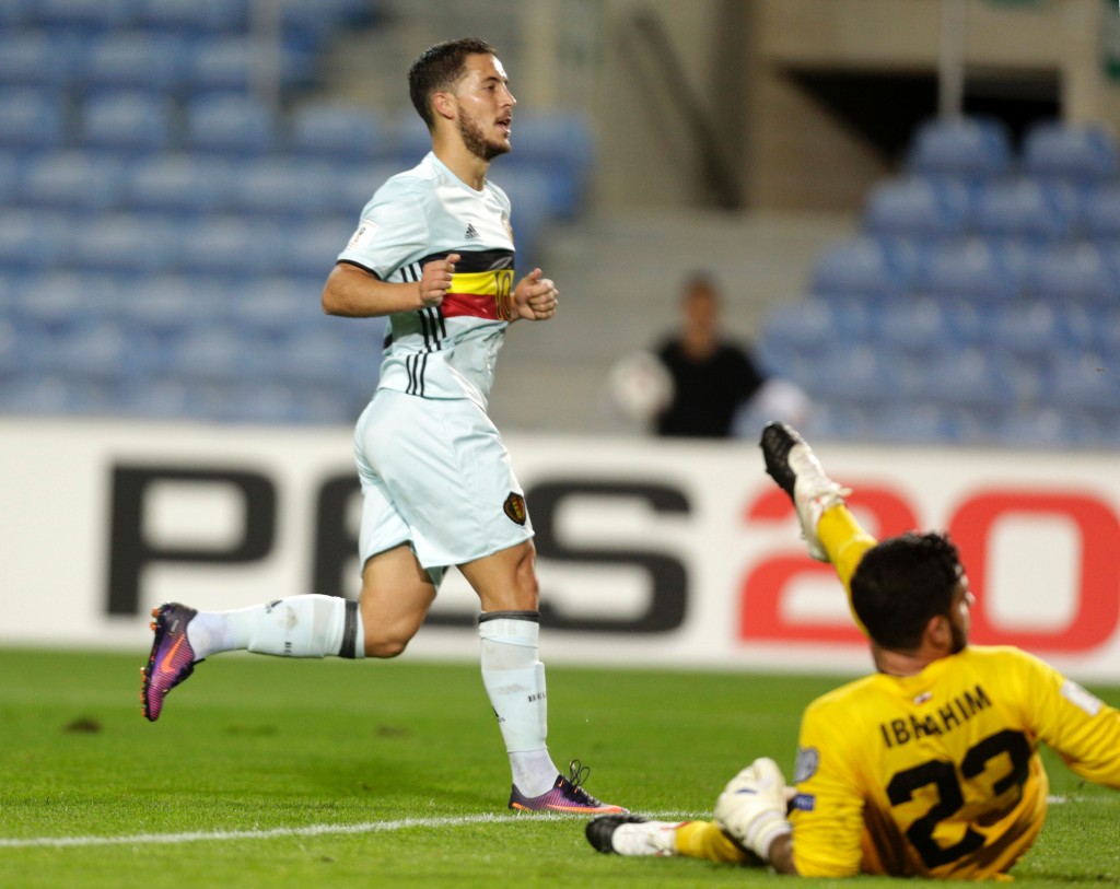 Belgium's forward Eden Hazard (L) celebrates his goal past Gibraltar's goalkeeper Deren Ibrahim during the WC 2018 football qualification match Gibraltar vs Belgium at the Faro Municipal Stadium in Faro on October 10, 2016. / AFP / JOSE MANUEL RIBEIRO (Photo credit should read JOSE MANUEL RIBEIRO/AFP/Getty Images)