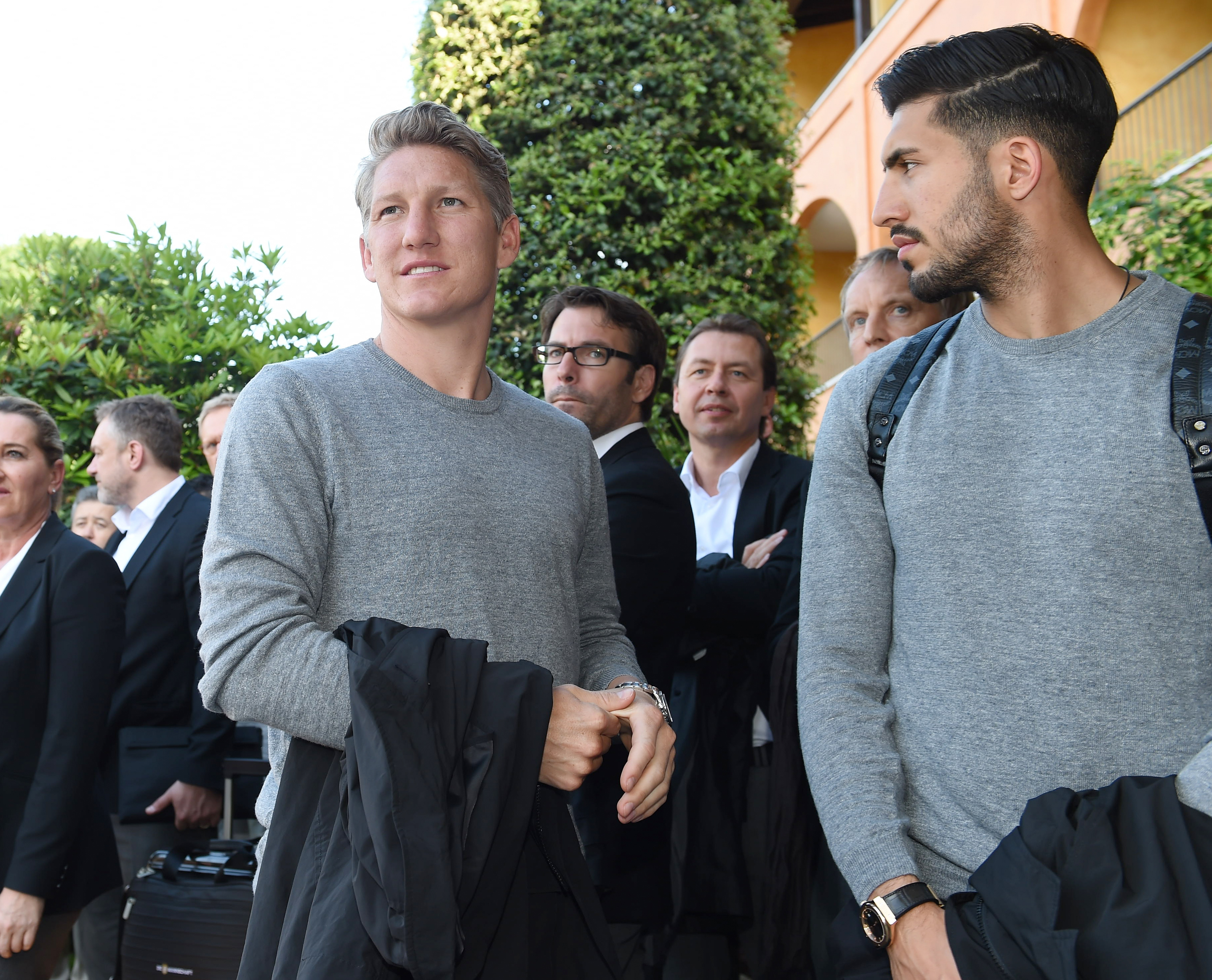 ASCONA, SWITZERLAND - MAY 24: Bastian Schweinsteiger and Emre Can of Germany arrives with the German national football team, ahead their EURO 2016 training camp, at Hotel Giardino on May 24, 2016 in Ascona, Switzerland. (Photo by Markus Gilliar-Pool/Bongarts/Getty Images)