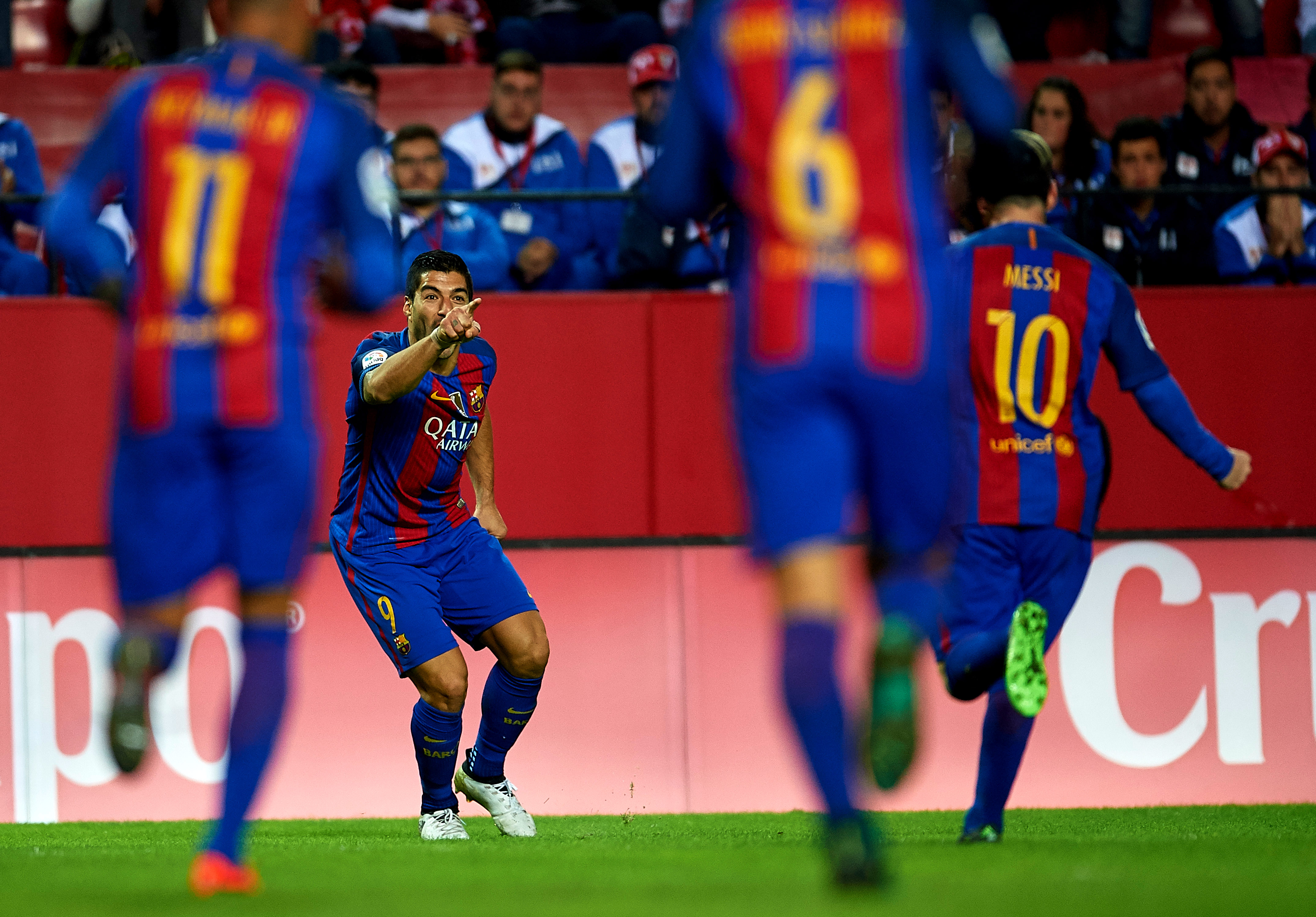 SEVILLE, SPAIN - NOVEMBER 06:  Luis Suarez of FC Barcelona  celebrates after scoring with his team mate Lionel Messi of FC Barcelona  during the match between Sevilla FC vs FC Barcelona as part of La Liga at Ramon Sanchez Pizjuan Stadium on November 6, 2016 in Seville, Spain.  (Photo by Aitor Alcalde/Getty Images)