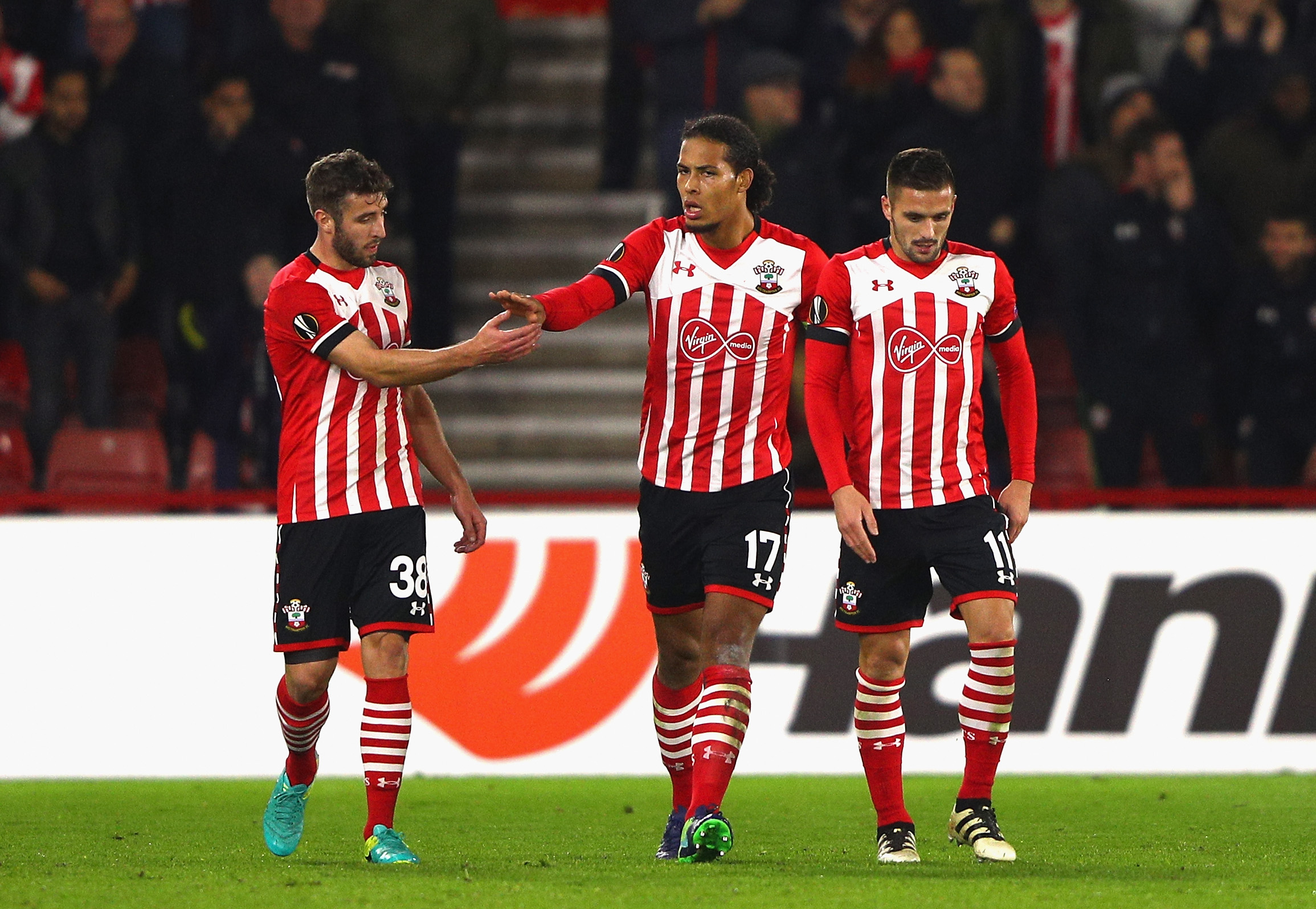 SOUTHAMPTON, ENGLAND - NOVEMBER 03: Virgil van Dijk of Southampton (C) celebrates with Sam McQueen (L) and Dusan Tadic (R) after scoring his team's first goal during the UEFA Europa League Group K match between Southampton FC and FC Internazionale Milano at St Mary's Stadium on November 3, 2016 in Southampton, England. (Photo by Ian Walton/Getty Images)