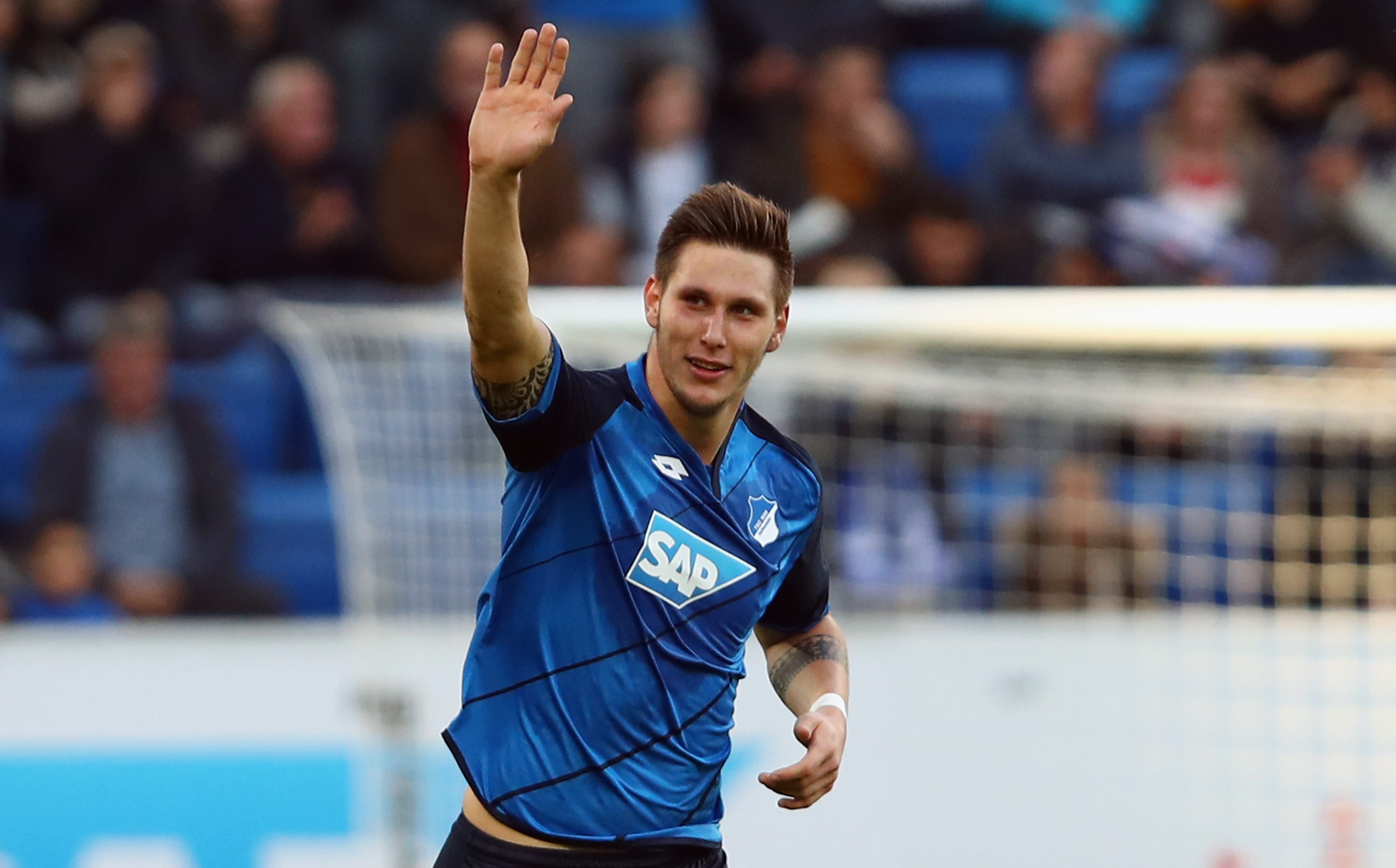 SINSHEIM, GERMANY - OCTOBER 30: Niklas Suele of Hoffenheim celebrates his team's first goal during the Bundesliga match between TSG 1899 Hoffenheim and Hertha BSC at Wirsol Rhein-Neckar-Arena on October 30, 2016 in Sinsheim, Germany.  (Photo by Alex Grimm/Bongarts/Getty Images)