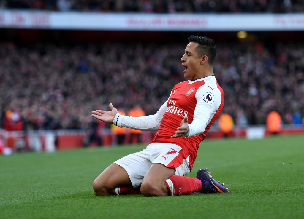 LONDON, ENGLAND - NOVEMBER 27: Alexis Sanchez of Arsenal celebrates scoring his sides first goal during the Premier League match between Arsenal and AFC Bournemouth at Emirates Stadium on November 27, 2016 in London, England. (Photo by Shaun Botterill/Getty Images)