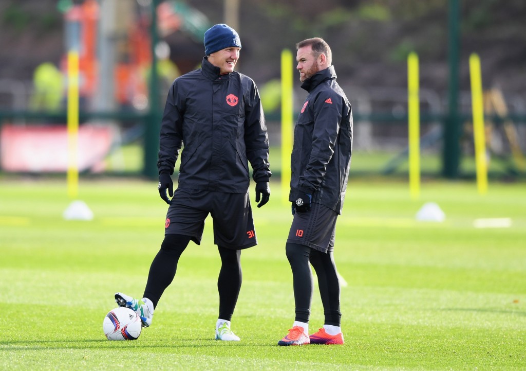 MANCHESTER, ENGLAND - NOVEMBER 23:  Wayne Rooney and Bastian Schweinsteiger in discussion during a Manchester United training session on the eve of their UEFA Europa League match against Feyenoord at Aon Training Complex on November 23, 2016 in Manchester, England.  (Photo by Gareth Copley/Getty Images)