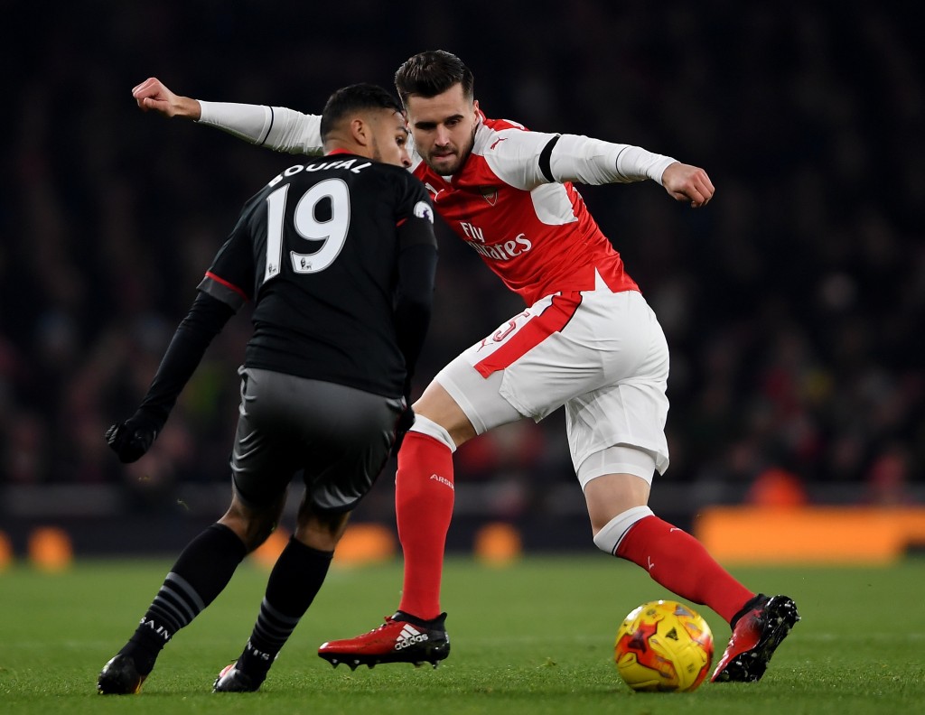 LONDON, ENGLAND - NOVEMBER 30: Sofiane Boufal of Southampton runs at Carl Jenkinson of Arsenal during the EFL Cup quarter final match between Arsenal and Southampton at the Emirates Stadium on November 30, 2016 in London, England. (Photo by Mike Hewitt/Getty Images)