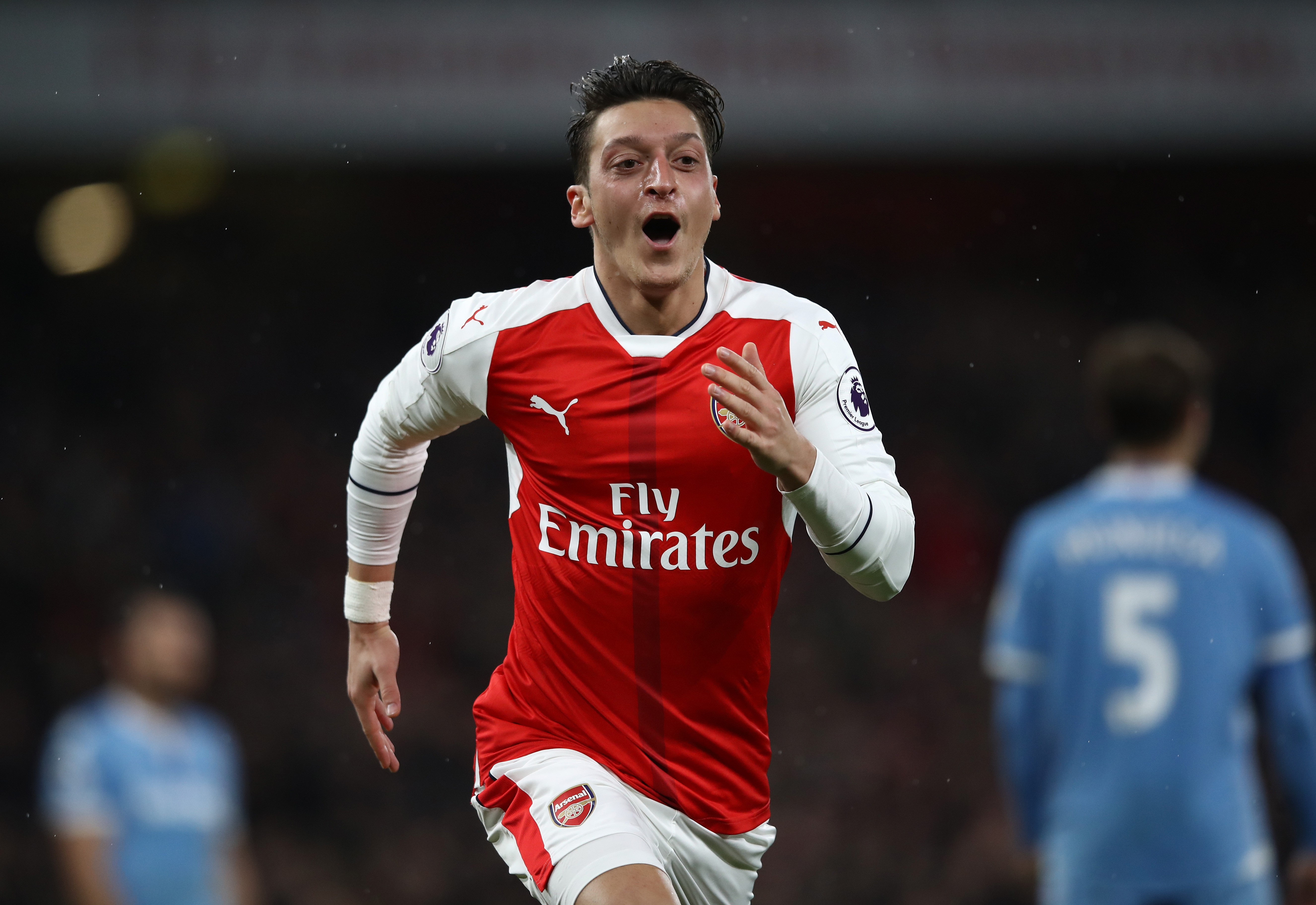 LONDON, ENGLAND - DECEMBER 10:  Mesut Ozil of Arsenal celebrates scoring his sides second goal during the Premier League match between Arsenal and Stoke City at the Emirates Stadium on December 10, 2016 in London, England.  (Photo by Julian Finney/Getty Images)
