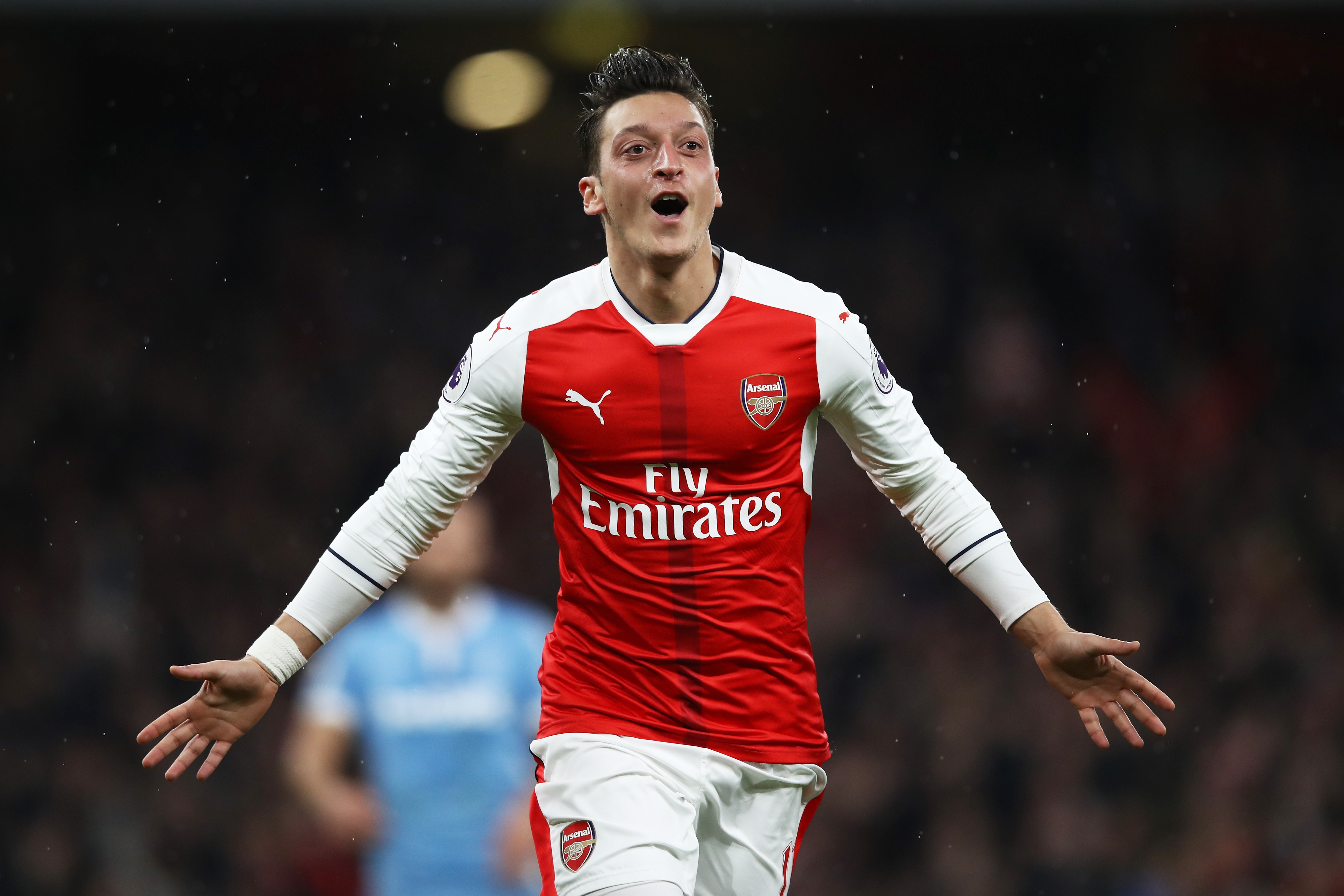 LONDON, ENGLAND - DECEMBER 10:  Mesut Ozil of Arsenal celebrates scoring his sides second goal during the Premier League match between Arsenal and Stoke City at the Emirates Stadium on December 10, 2016 in London, England.  (Photo by Julian Finney/Getty Images)